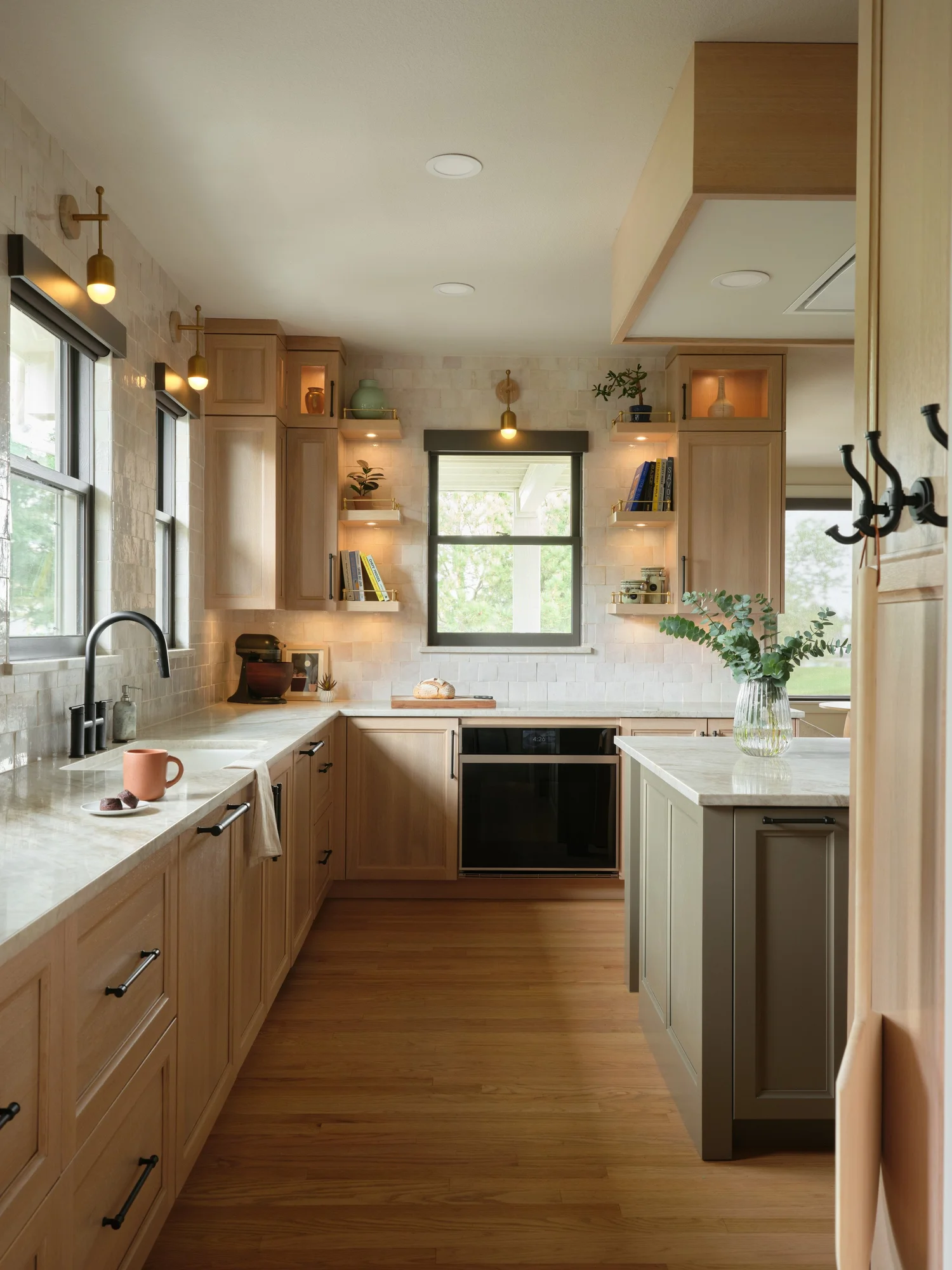 Perimeter run with the handleless baking oven, zellige and open shelves