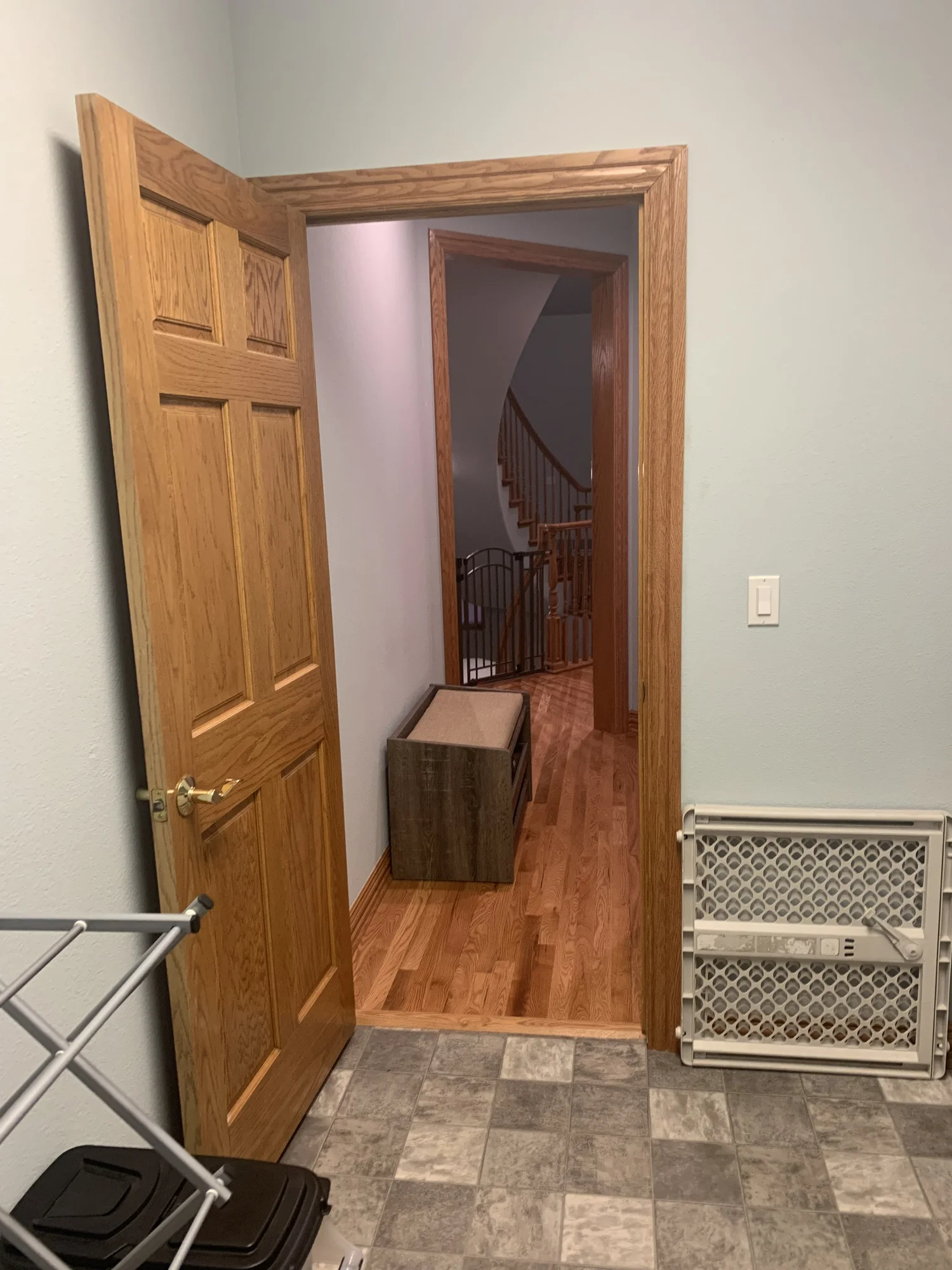 The original laundry room door looking out toward the staircase
