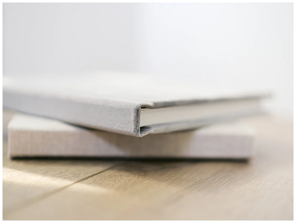stack of family photo albums