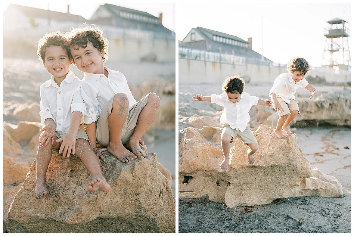 siblings posing on a rock at a family session