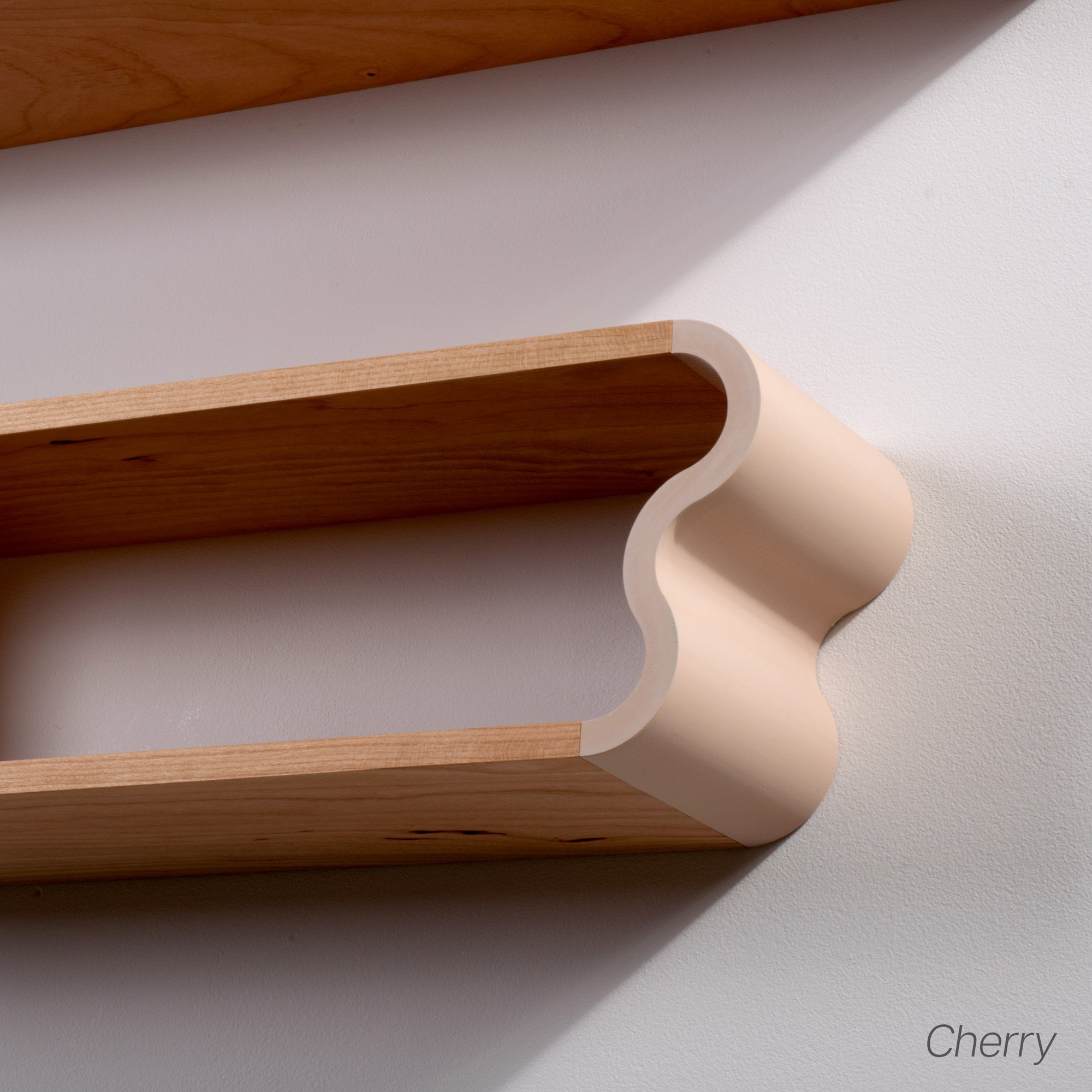 Detail photo of 19.5" cherry and pastel pink Squiggle Floating Shelves | Pastel Accented Cherry and Ash Hardwood Shelving | Modular Display & Storage | Floating Shelving | Wall Shelf