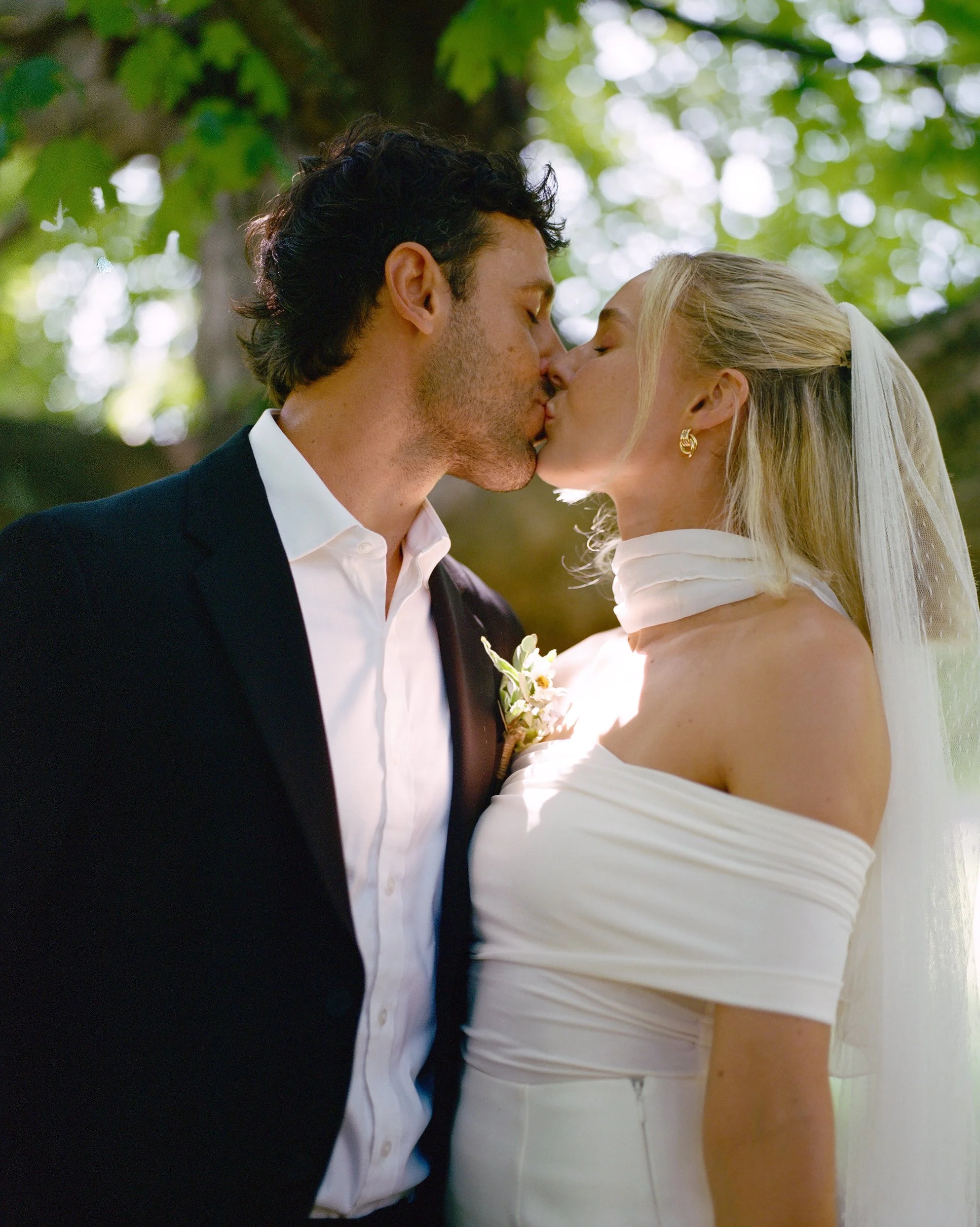 Elopement Photographer in NYC, close up of bride and groom kissing