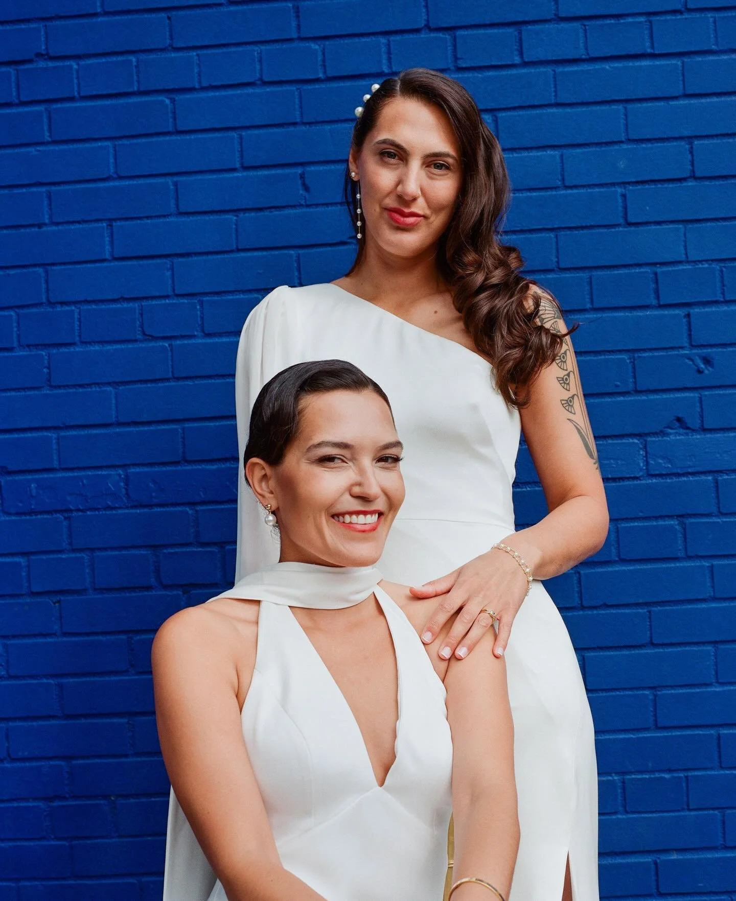 Erika &amp; Talia
Pantone 282 C backdrop 
So much love for these two

&bull;

Shot on 35mm, 120mm &amp; super 8 @kodak film 

&bull;

Planner: @parisasocialevents
Florist: @anther_pistil 
Hair &amp; Makeup: @missharlequinmakeupandhair 
Venue: @dobbin