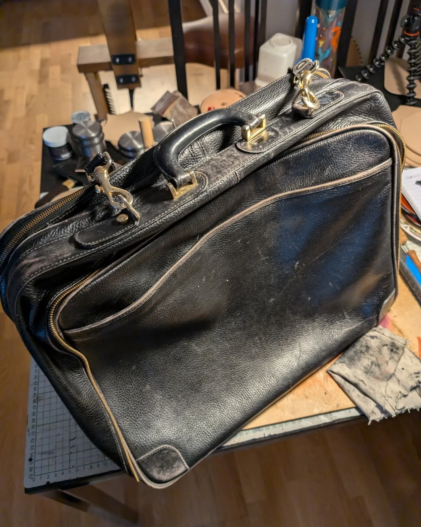 I recently did a repair job on this bag. The screws in the handle had come loose, so I opened the lining and re-attached the handle. I also conditioned it as it was quite dry and needed some TLC. The last photos show how big of a difference condition