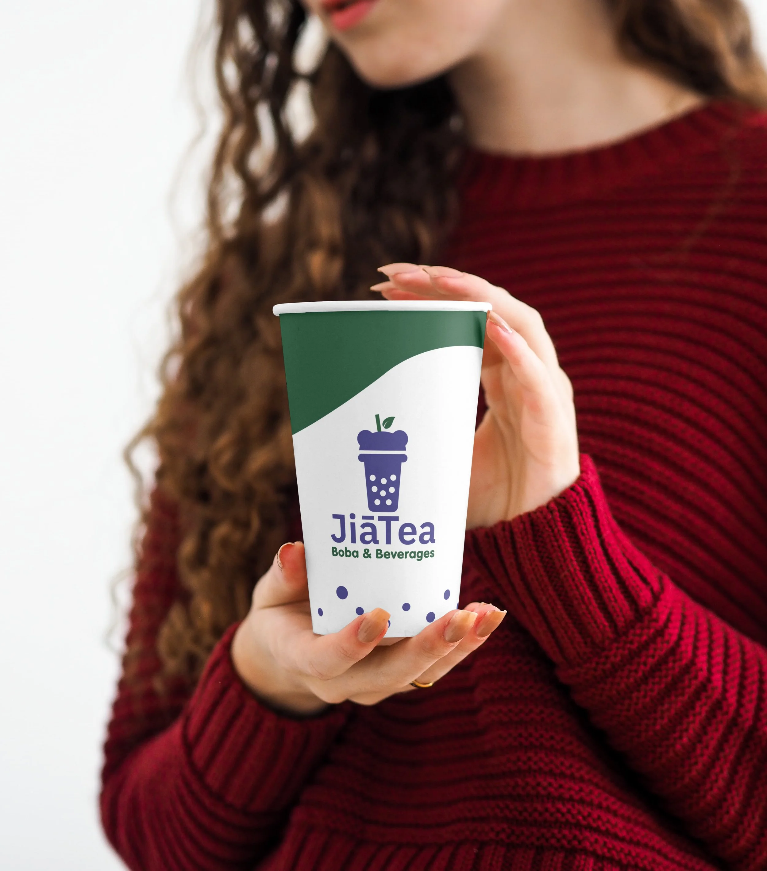 Coffee Cup in Women Hands Mockup.jpg