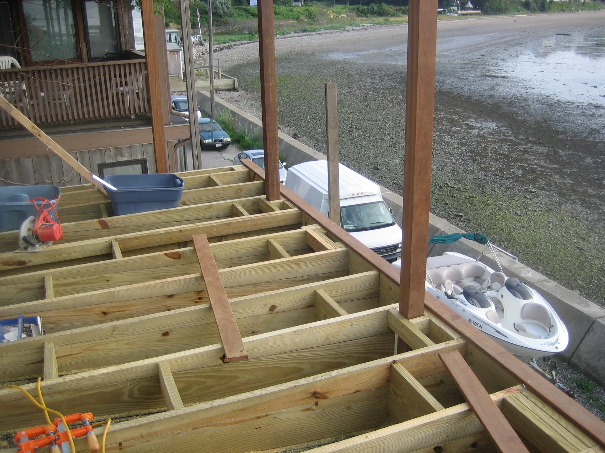 Deck floats on rubber roof. No penetrations with post. 