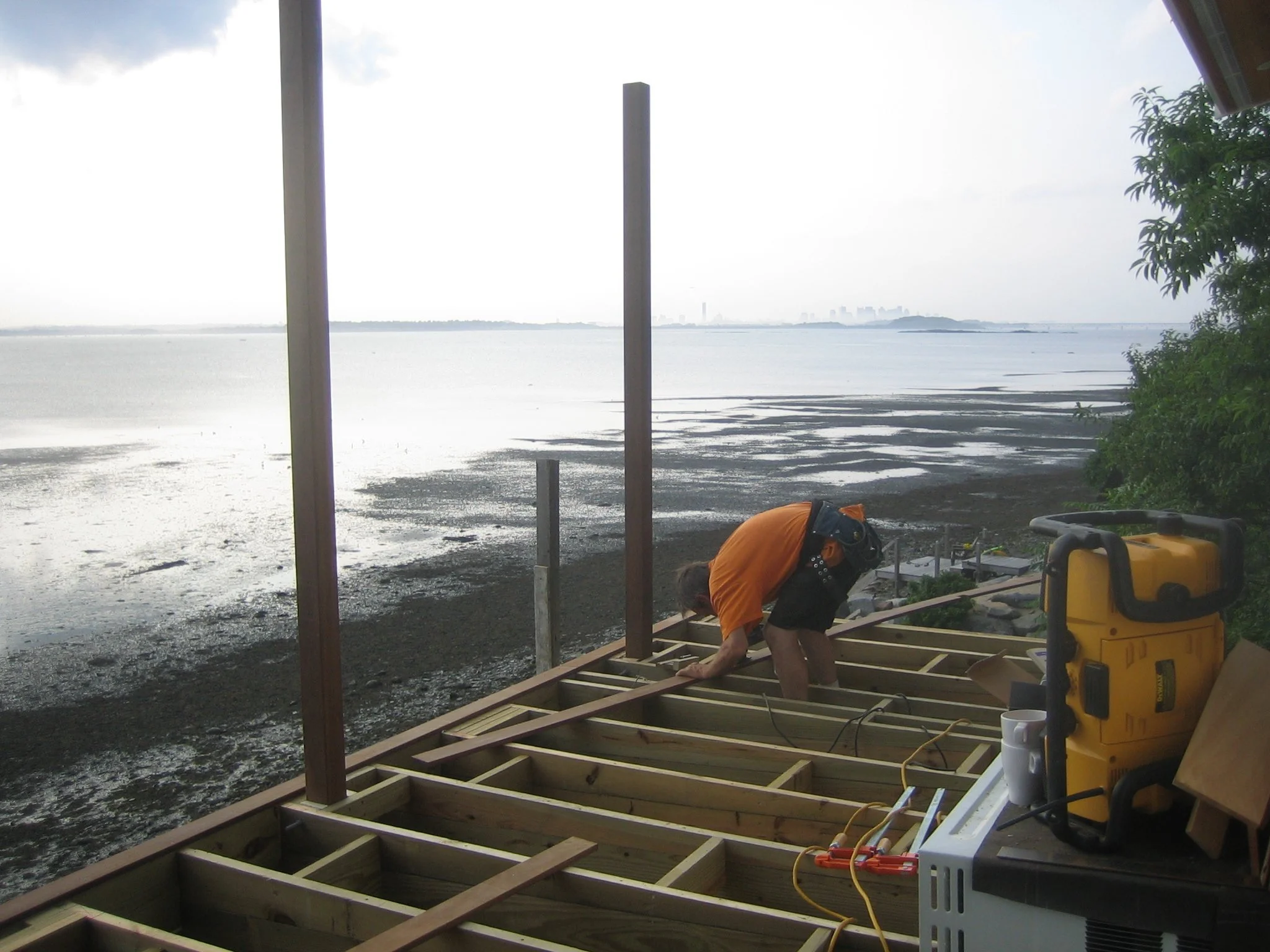 Quincy Bay Massachusetts overlooking Boston skyline. Briane McInerny starting ipe decking.
Screwed with stainless screws and ends sealed with Anchorseal®