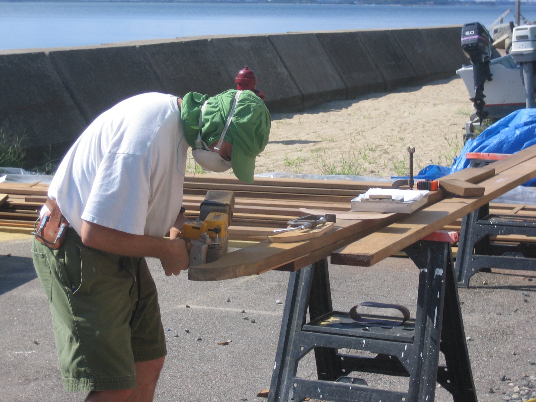 Paul Craig cutting and sanding 2"x6" ipe eagle motif.