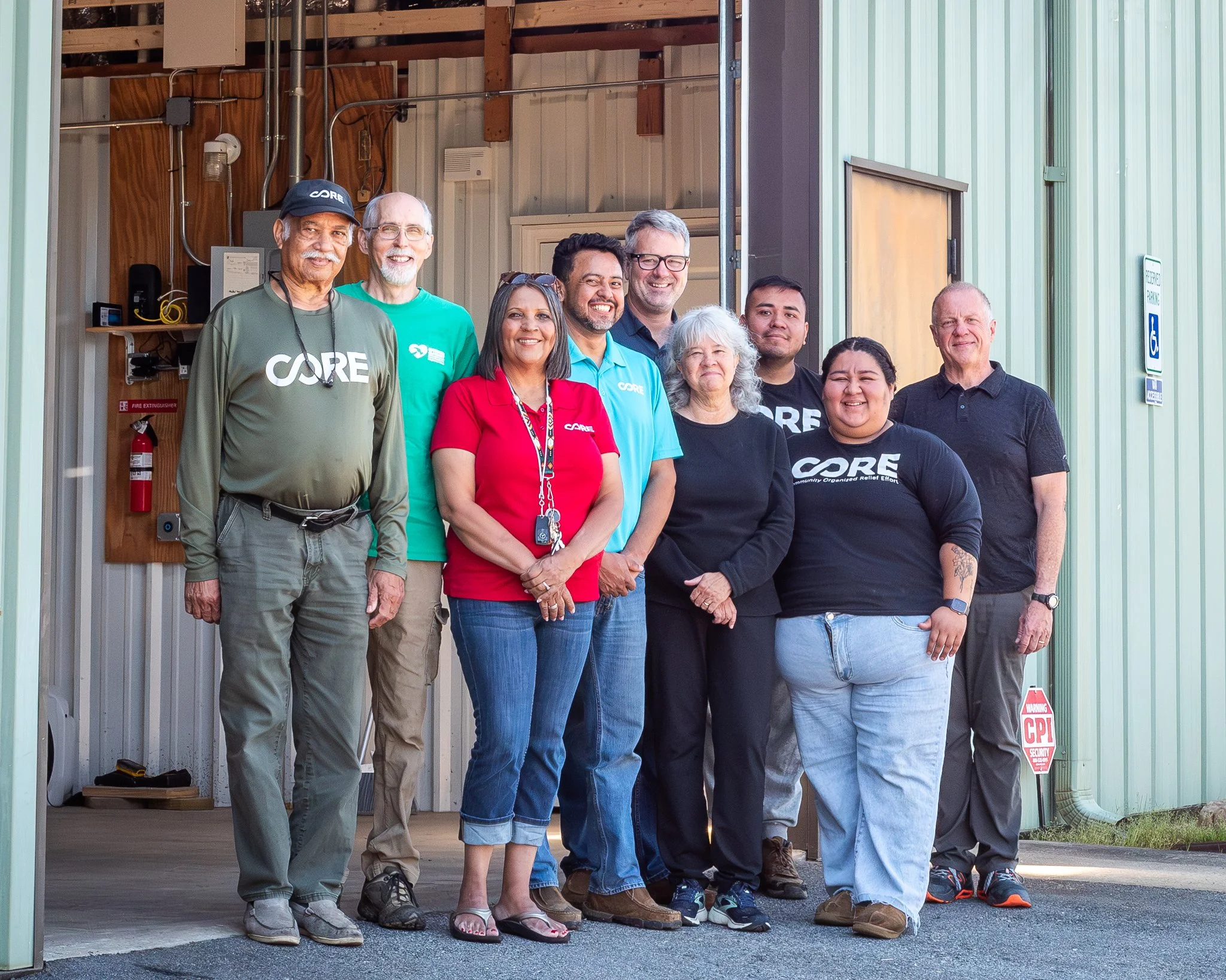  SVCM Hammer &amp; Heart and Community Organized Relief Efforts (CORE) staff members at Hammer &amp; Heart's new building in Black Mountain, May 2026. At its new headquarters, Hammer &amp; Heart plans to deepen its collaboration with CORE to help mor