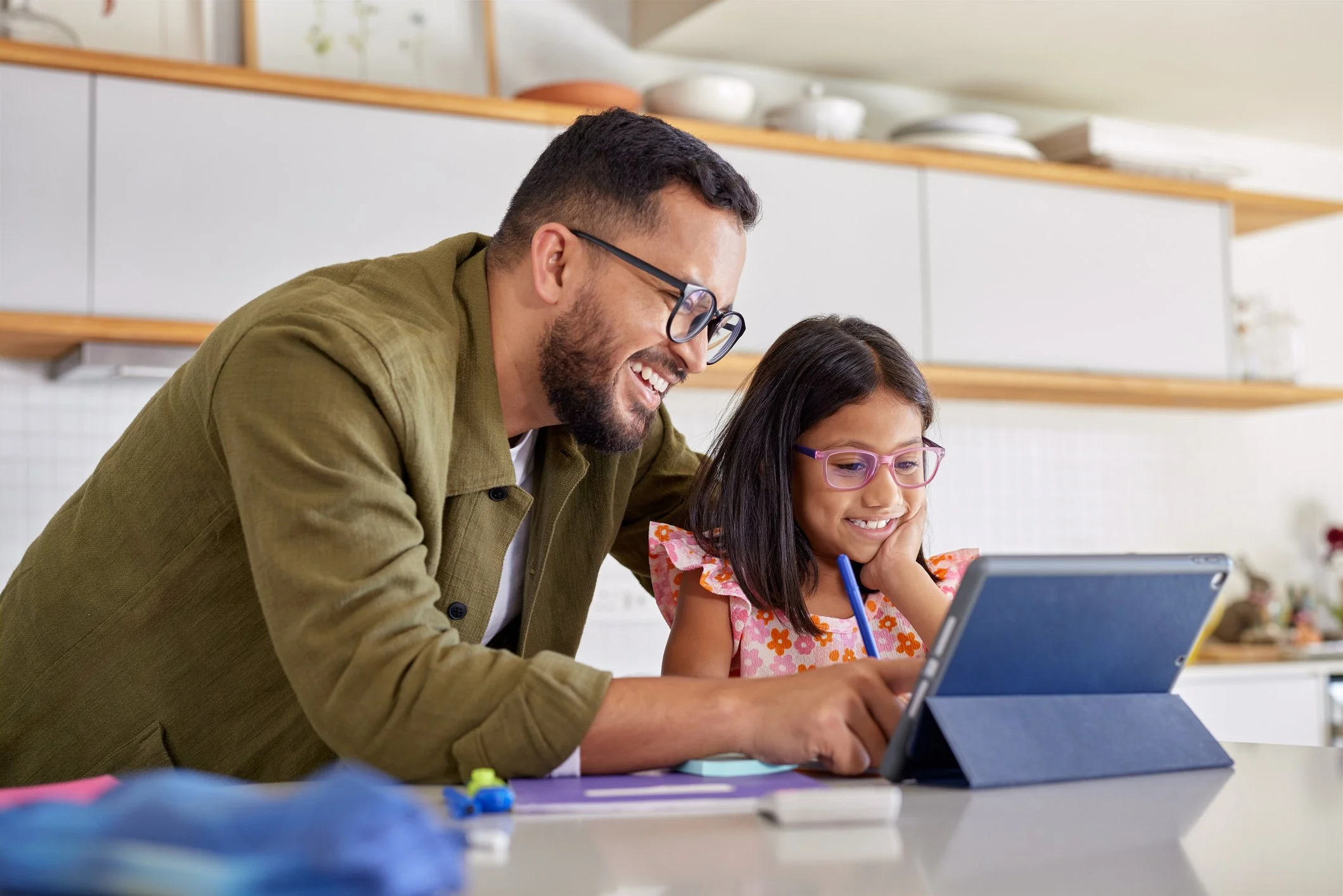 Father Supporting Daughter with Homework