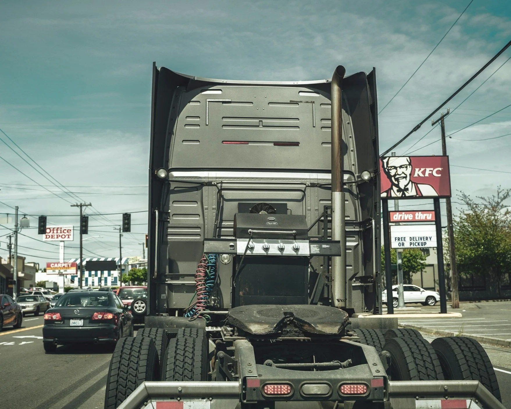 Rear view of the rear end of a semi-truck without a trailer attached.