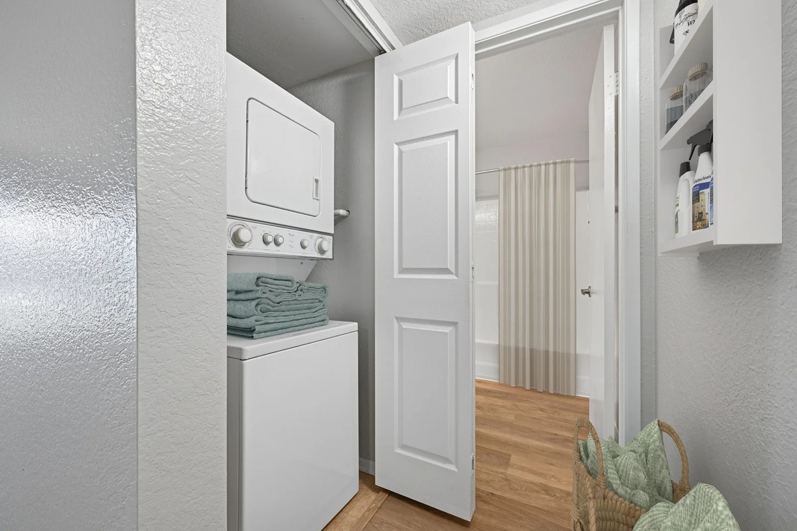 An image of the in-unit washer & dryer in the  Two-Bedroom, Two-Bathroom Unit. 