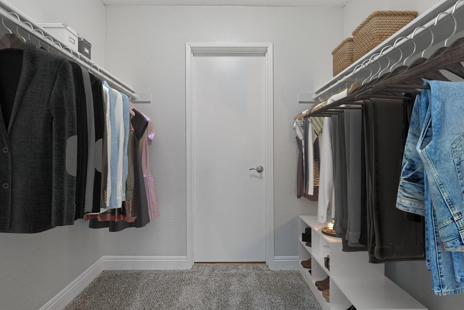 An image of our spacious primary bedroom closet in the Two-Bedroom, Two-Bathroom Unit, shown with Furniture. 