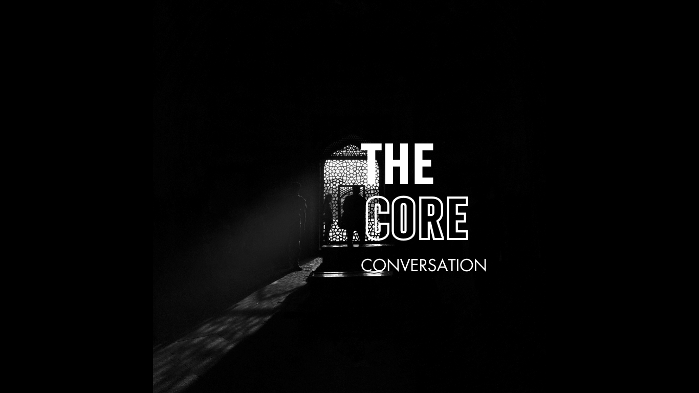 Silhouettes of two people standing in a dark room in front of an ornate door, with the text 'THE CORE CONVERSATION' overlaid.
