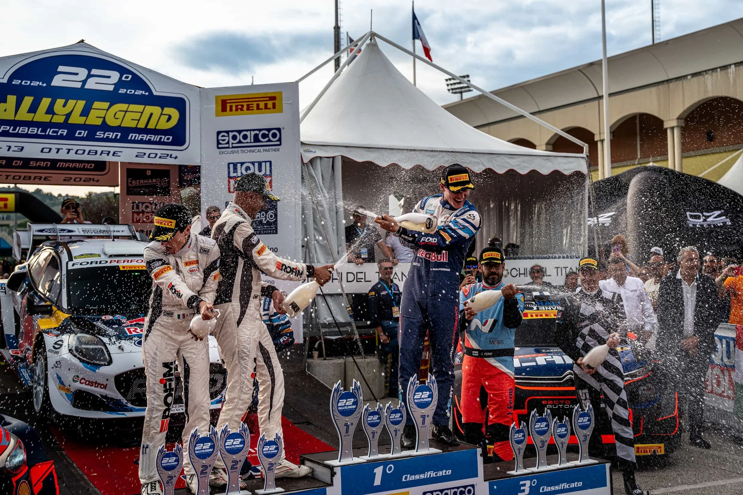 Siegerehrung mit Champagnerdusche bei der 22. Rallylegend San Marino 2024, Eventfotografie von Markus Mittermayer