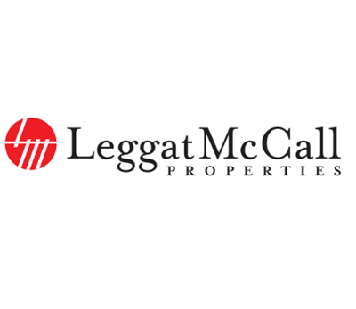 Logo of Leggat McCall Properties featuring a red circular symbol and black text.