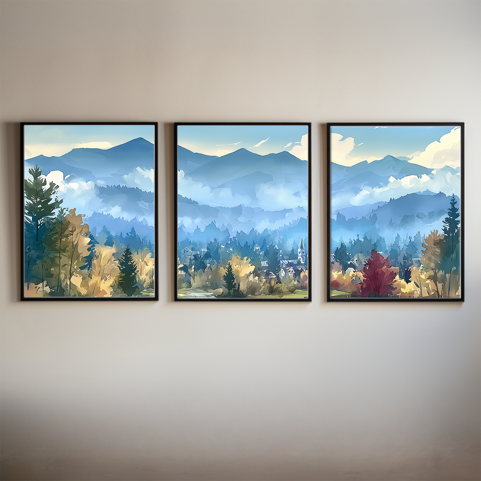 Three framed Stowe Vermont village watercolor paintings of misty blue mountains and autumn color, hung on a wall