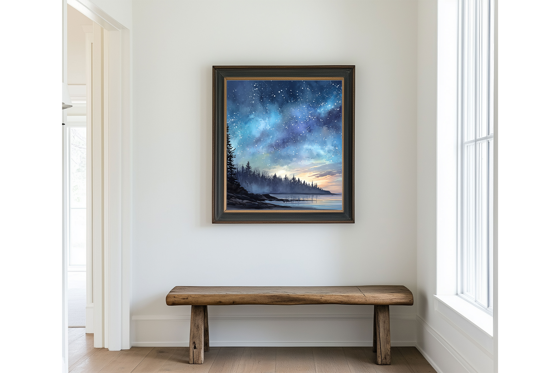 Framed Acadia-inspired night sky landscape print with stars, silhouetted trees, and calm shoreline displayed above a rustic wooden bench.