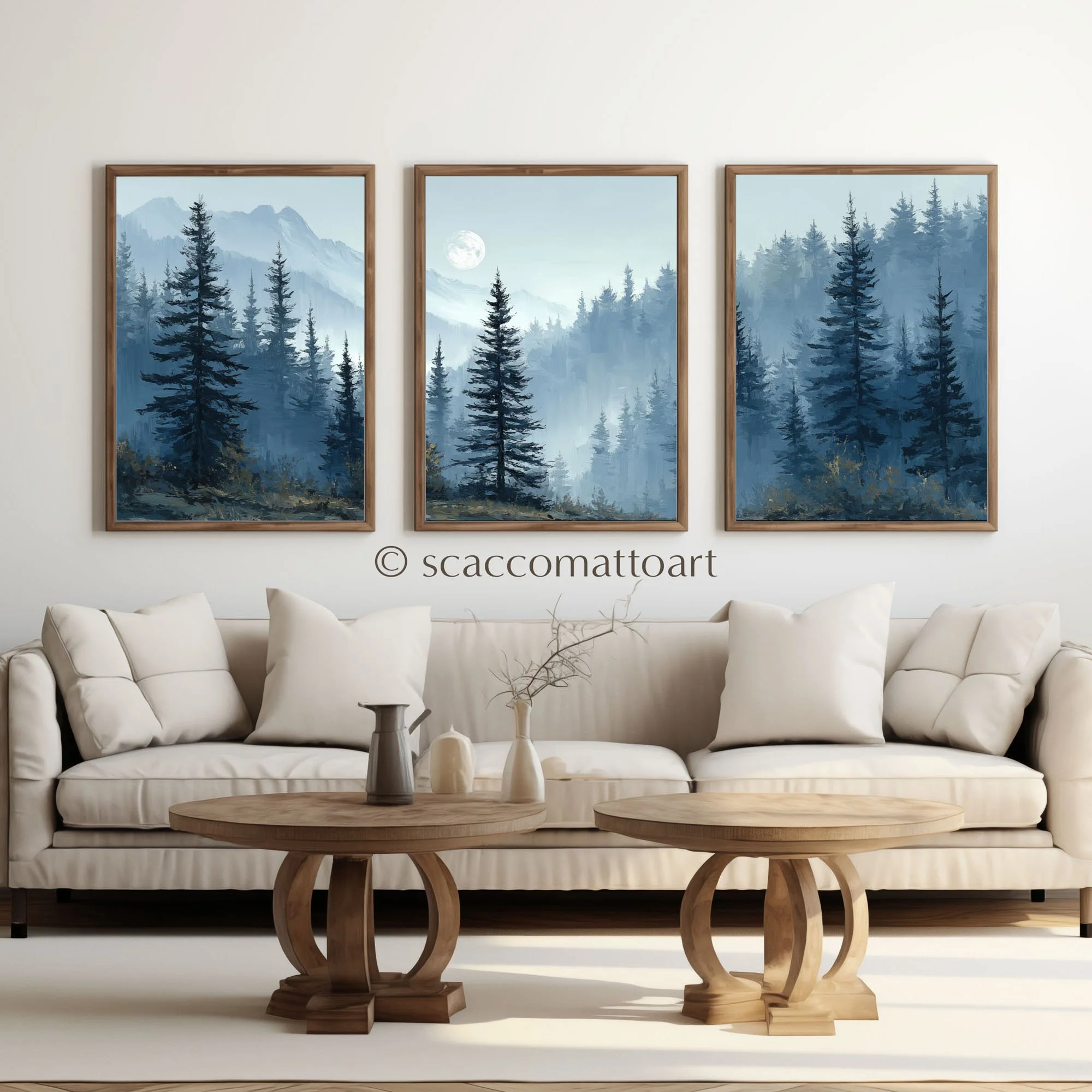 Olympic National Park by Moonlight watercolor triptych displayed above a cream living room sofa