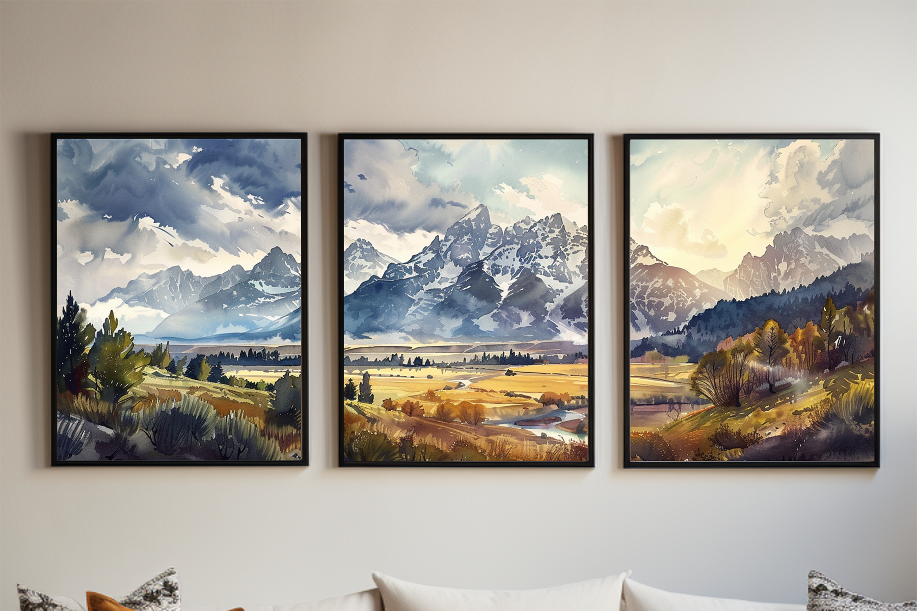 Framed Grand Teton triptych wall art above a bed, featuring watercolor mountain peaks, open valley light, and a reflective lake beneath a dramatic sky.