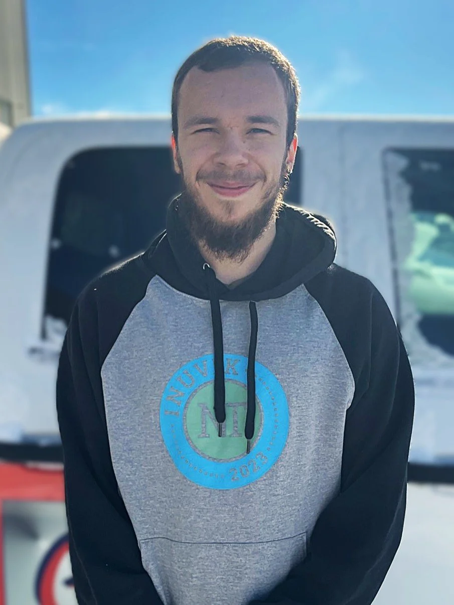 Illustration of a person wearing a cap and a shirt with a logo that reads 'Mechanical Plumbing, HVAC, Electrical'.