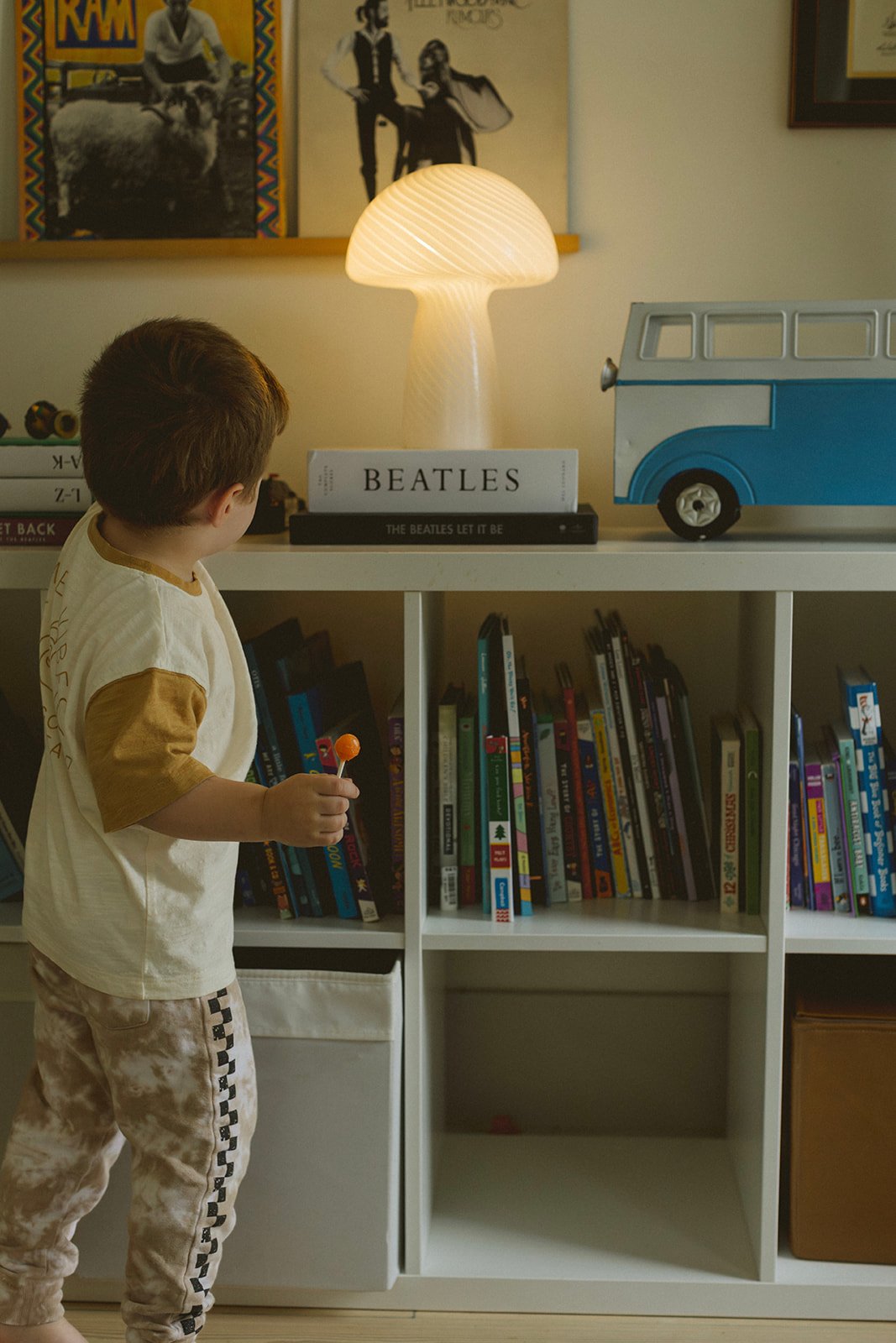 in-home-family-session-new-orleans-toddler-at-bookcase.jpg