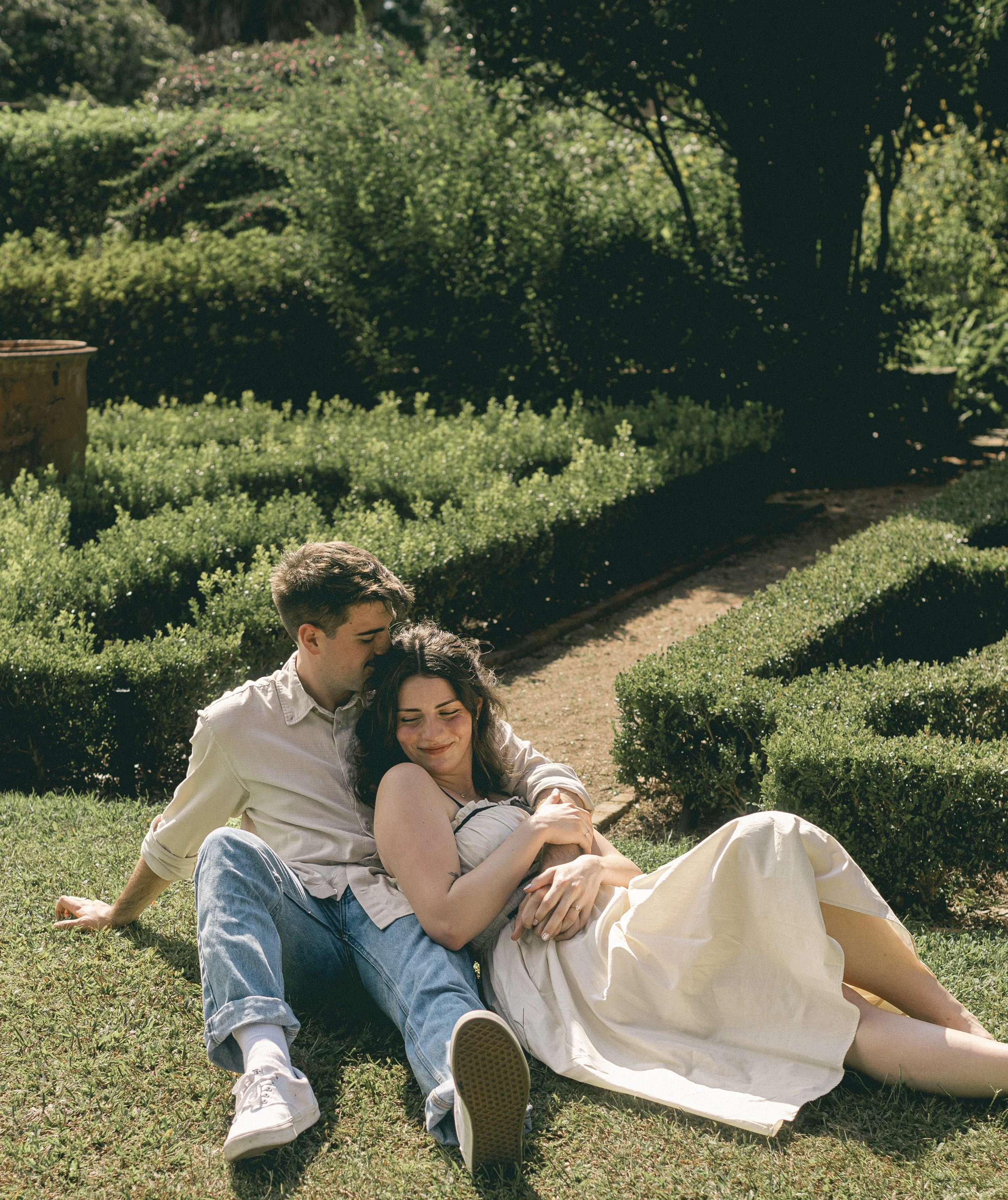 Intimate marriage proposal in the gardens at Longue Vue.