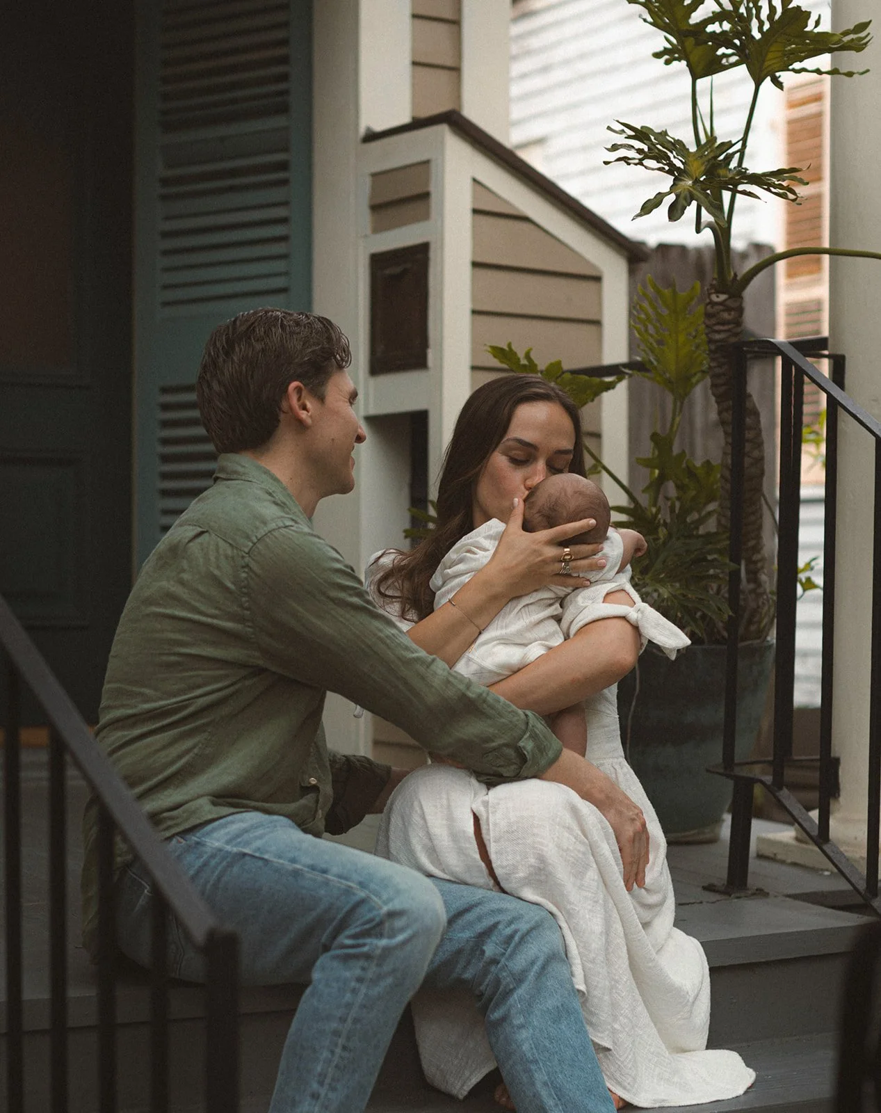 Editorial-style in-home newborn photography capturing timeless family memories in New Orleans.