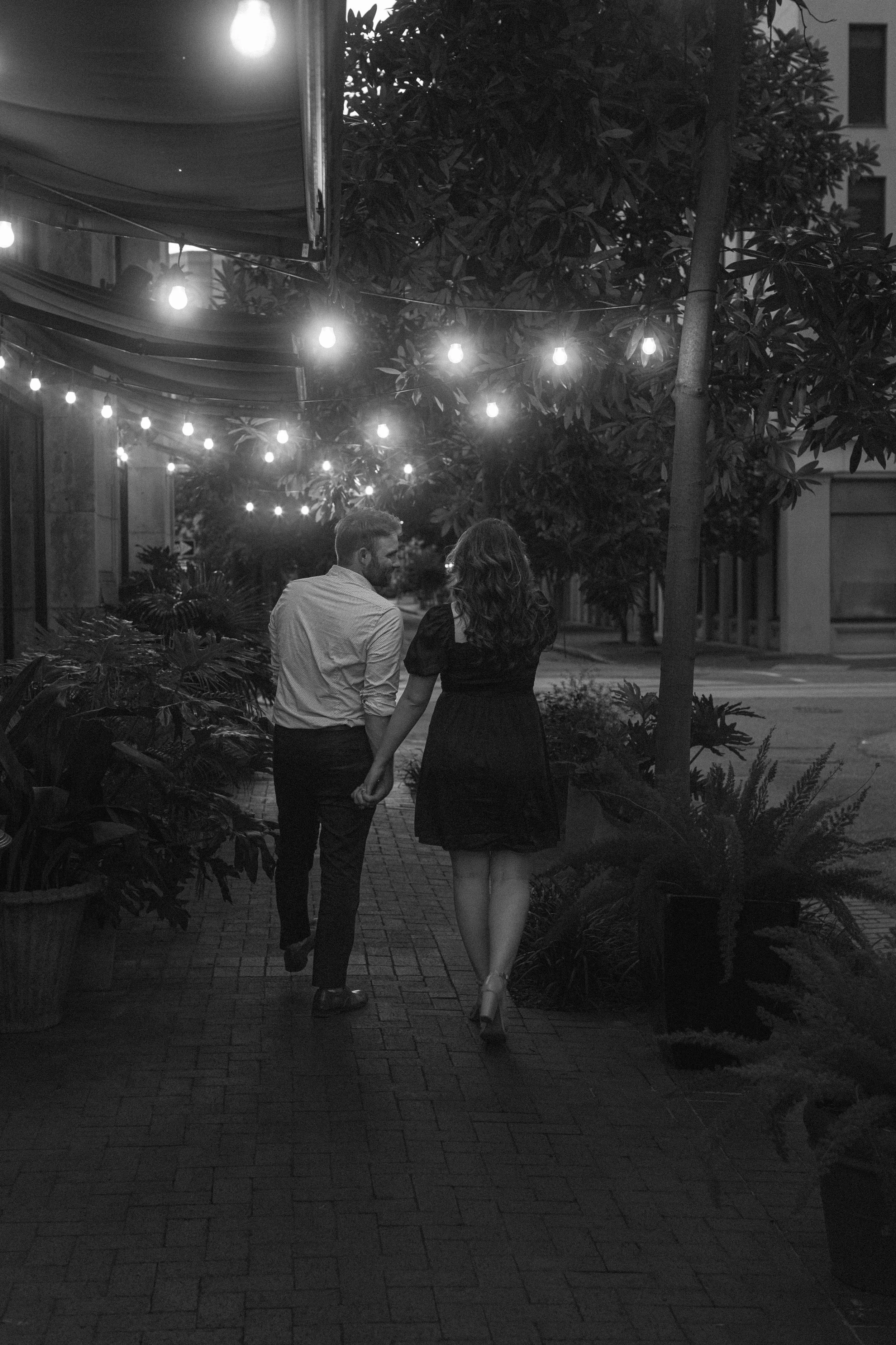 New Orleans proposal photographer capturing a photo of newly engaged couple in downtown NOLA.