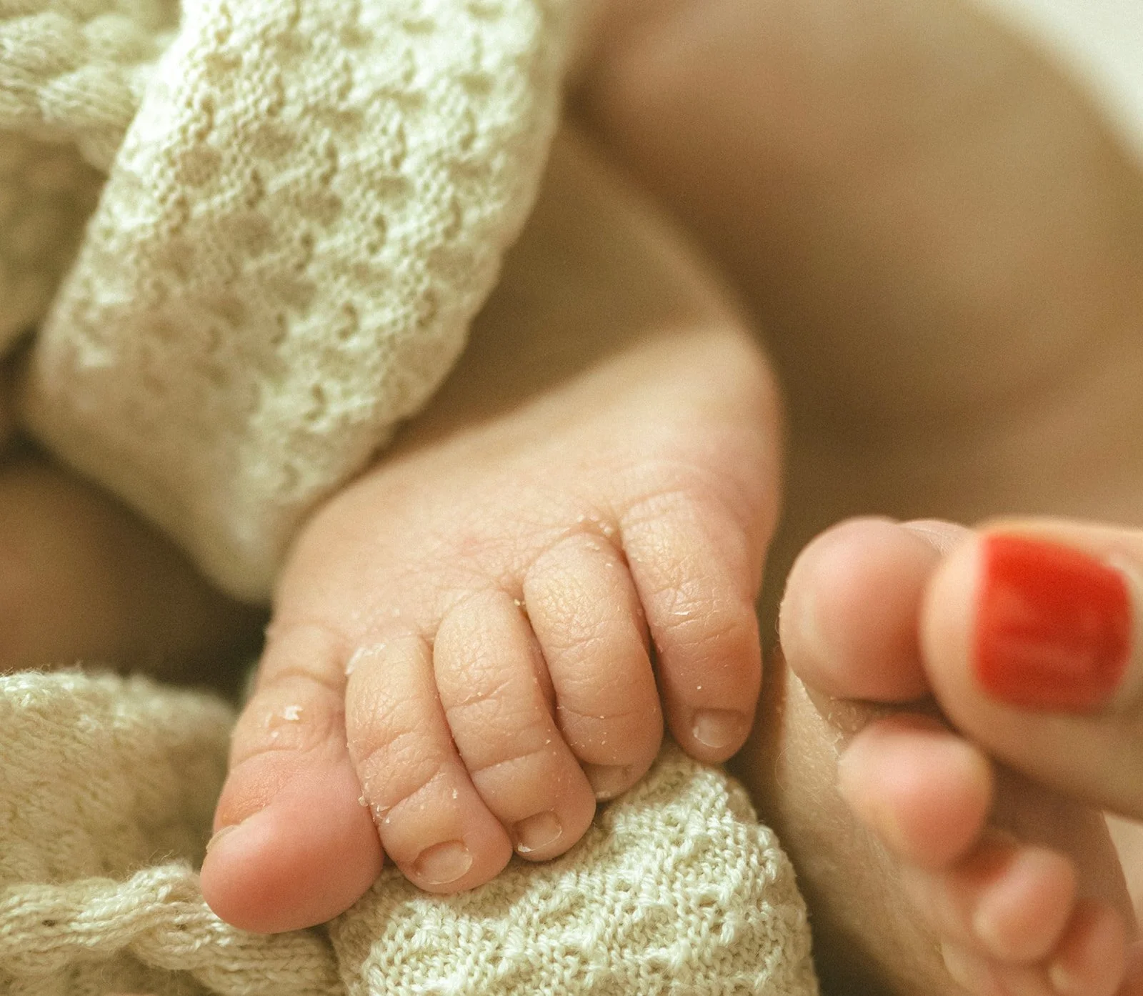 Close-up portrait of a newborn baby photographed naturally at home in Destrehan.