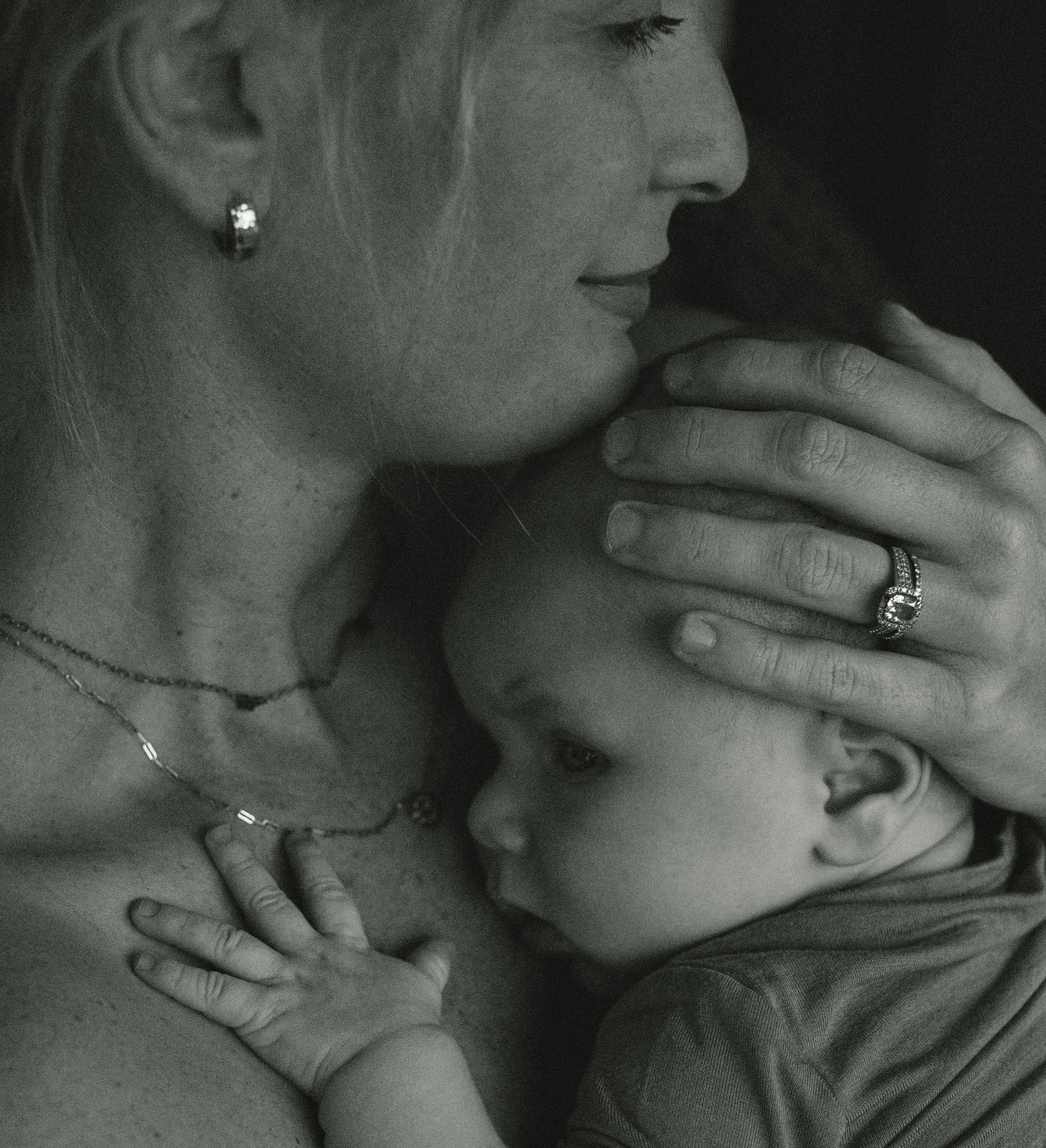 Mother embracing her son during a motherhood session in Lakeshore New Orleans
