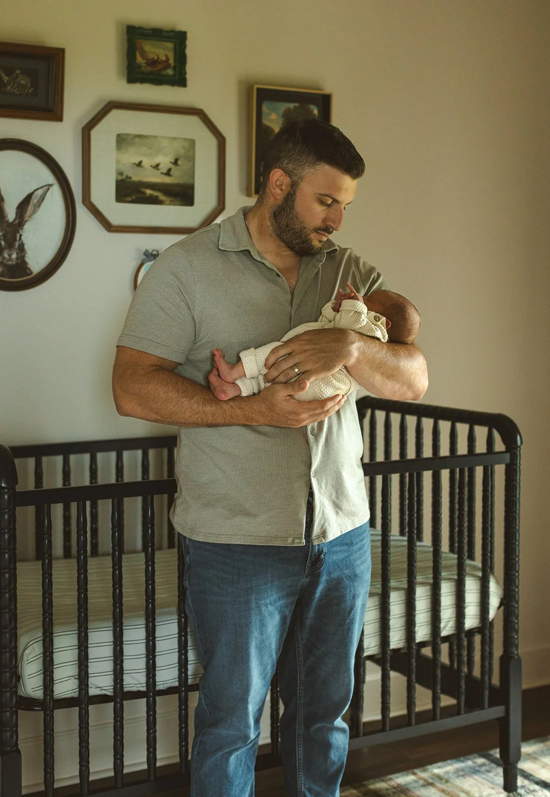 Family interacting naturally inside their home during a lifestyle photography session in Destrehan.