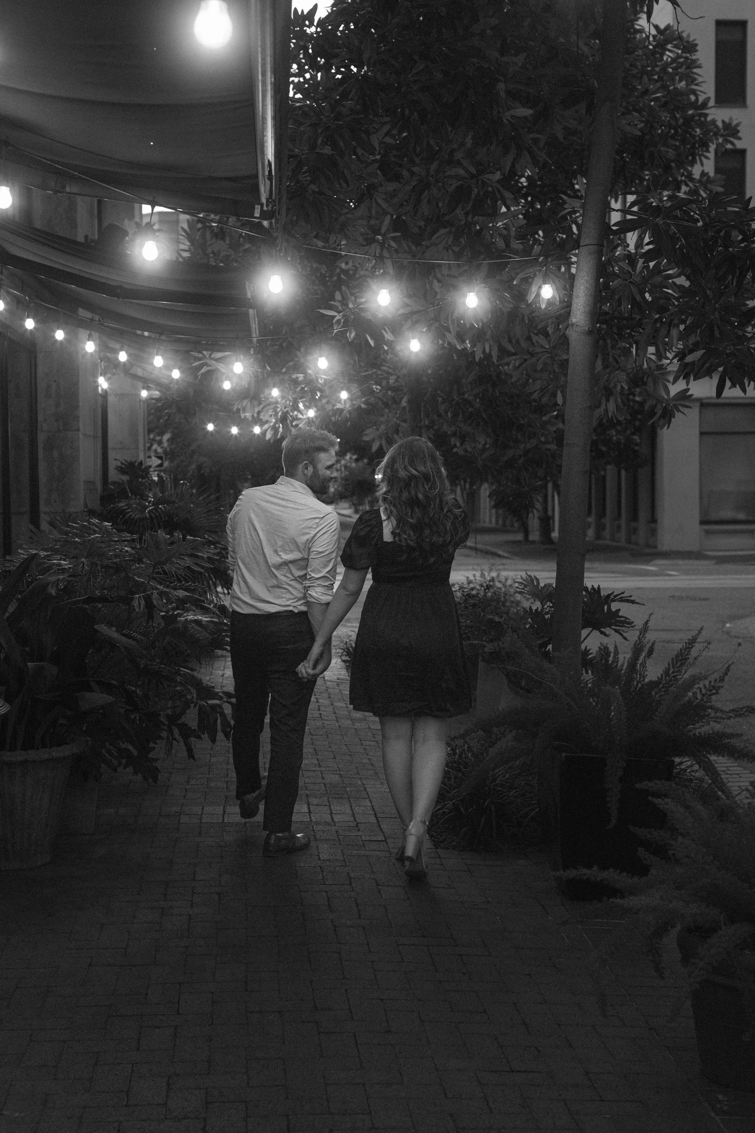 New Orleans proposal photographer capturing a photo of newly engaged couple in downtown NOLA.