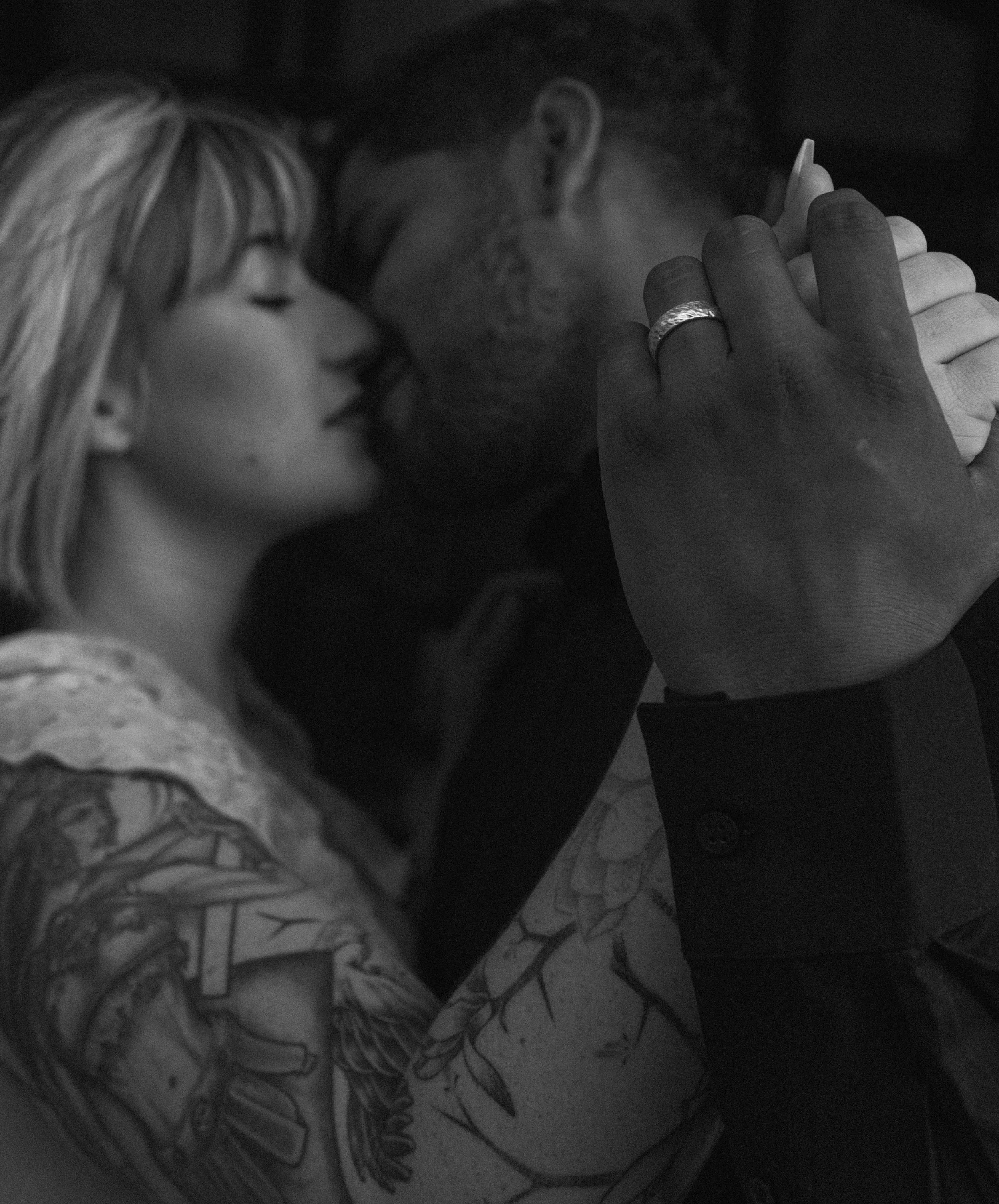 Romantic portrait of the couple forehead to forehead. 