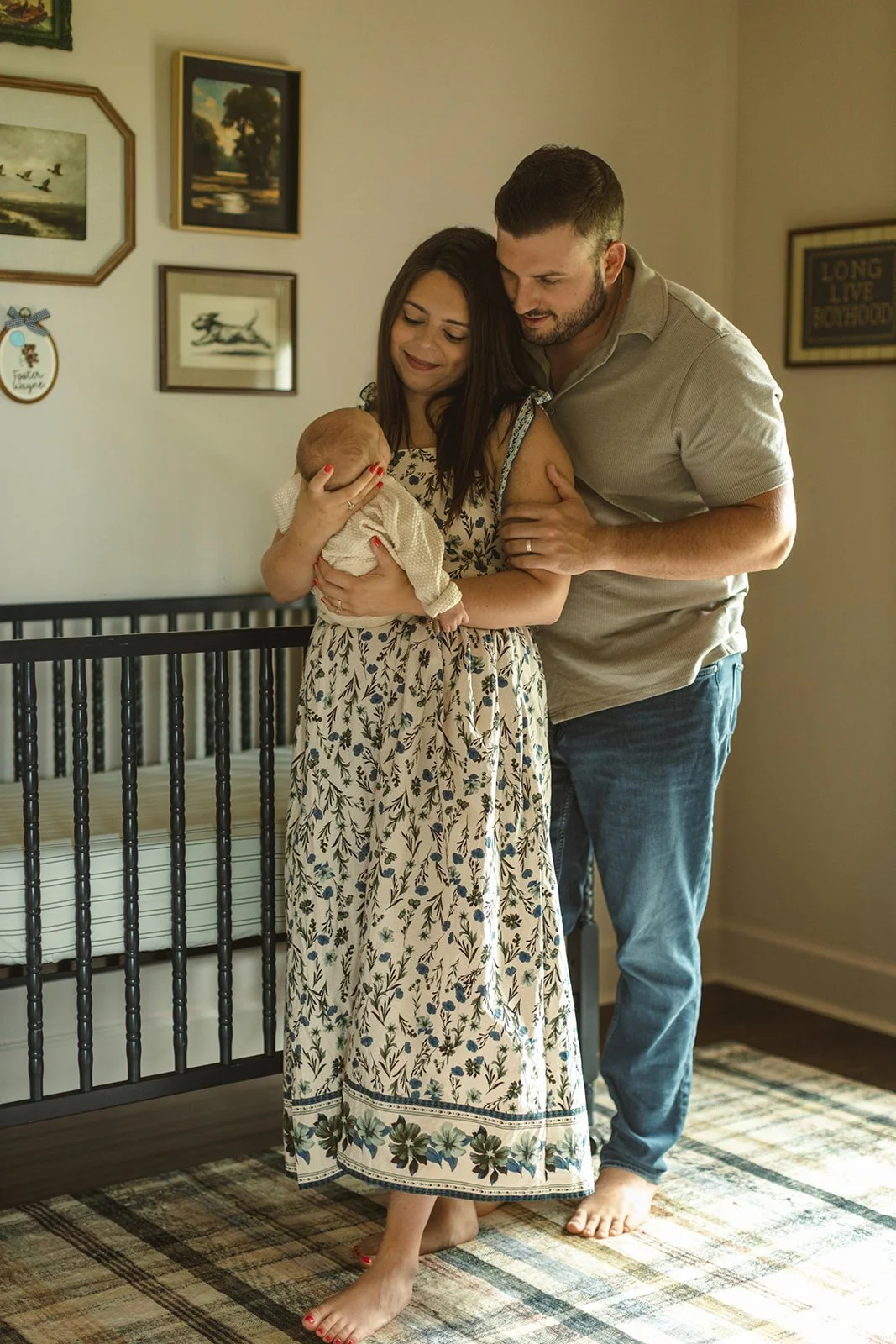 Family sharing a relaxed moment together during an in-home photography session in Destrehan, Louisiana.