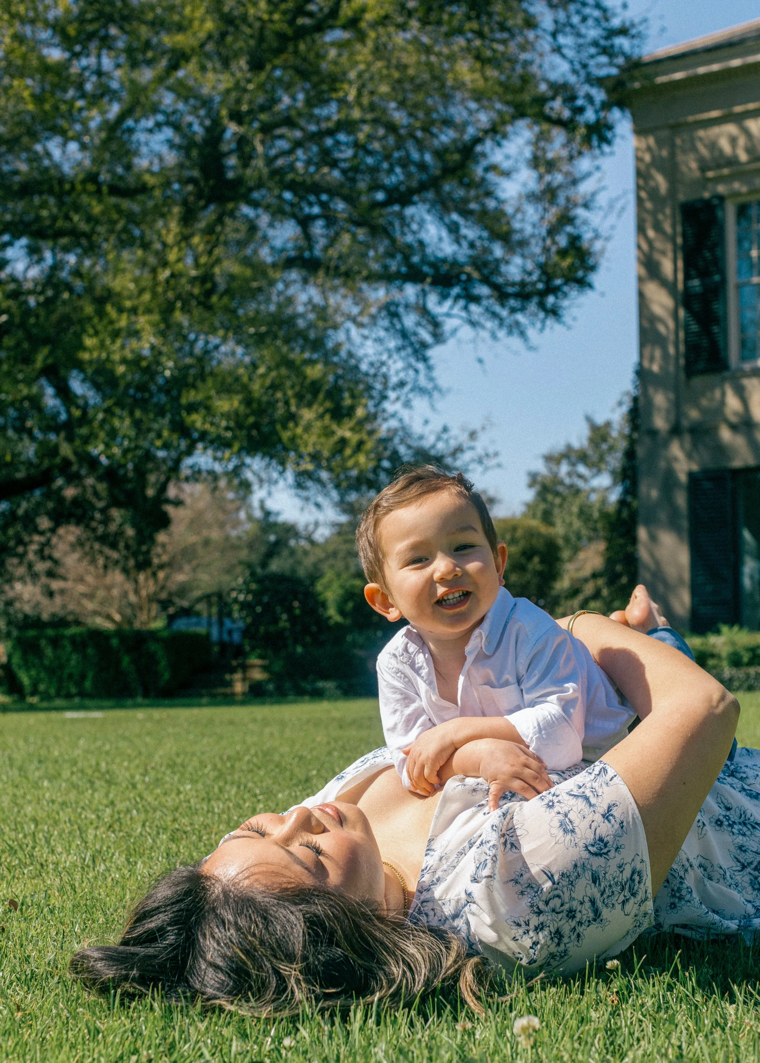 Tender moment of mother holding her child close during a family session in Metairie,LA.