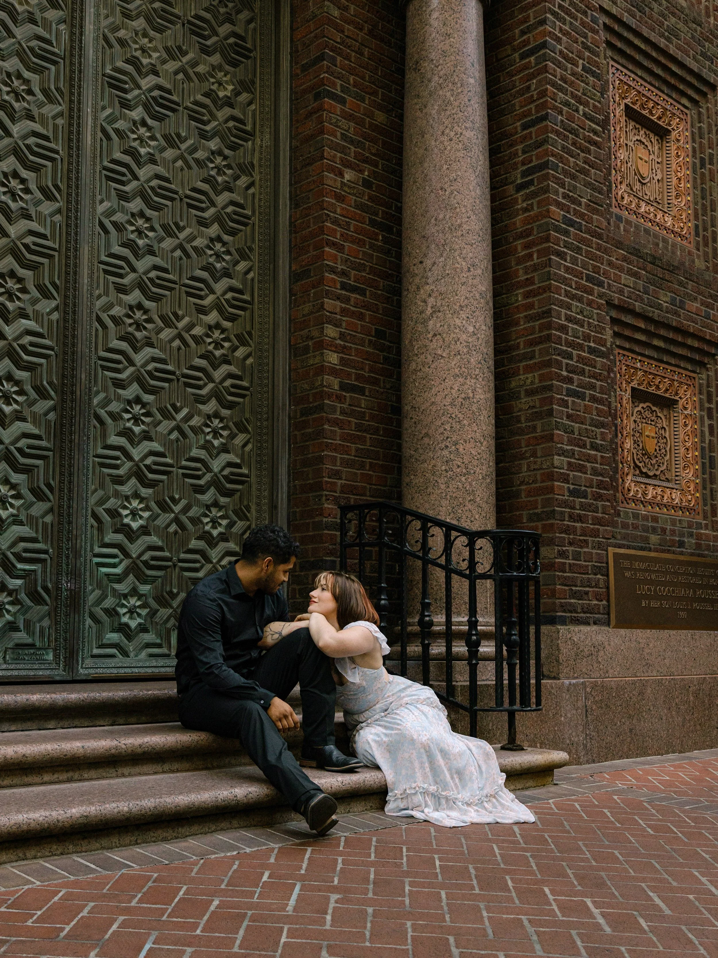 Couple embracing one another in downtown New Orleans.
