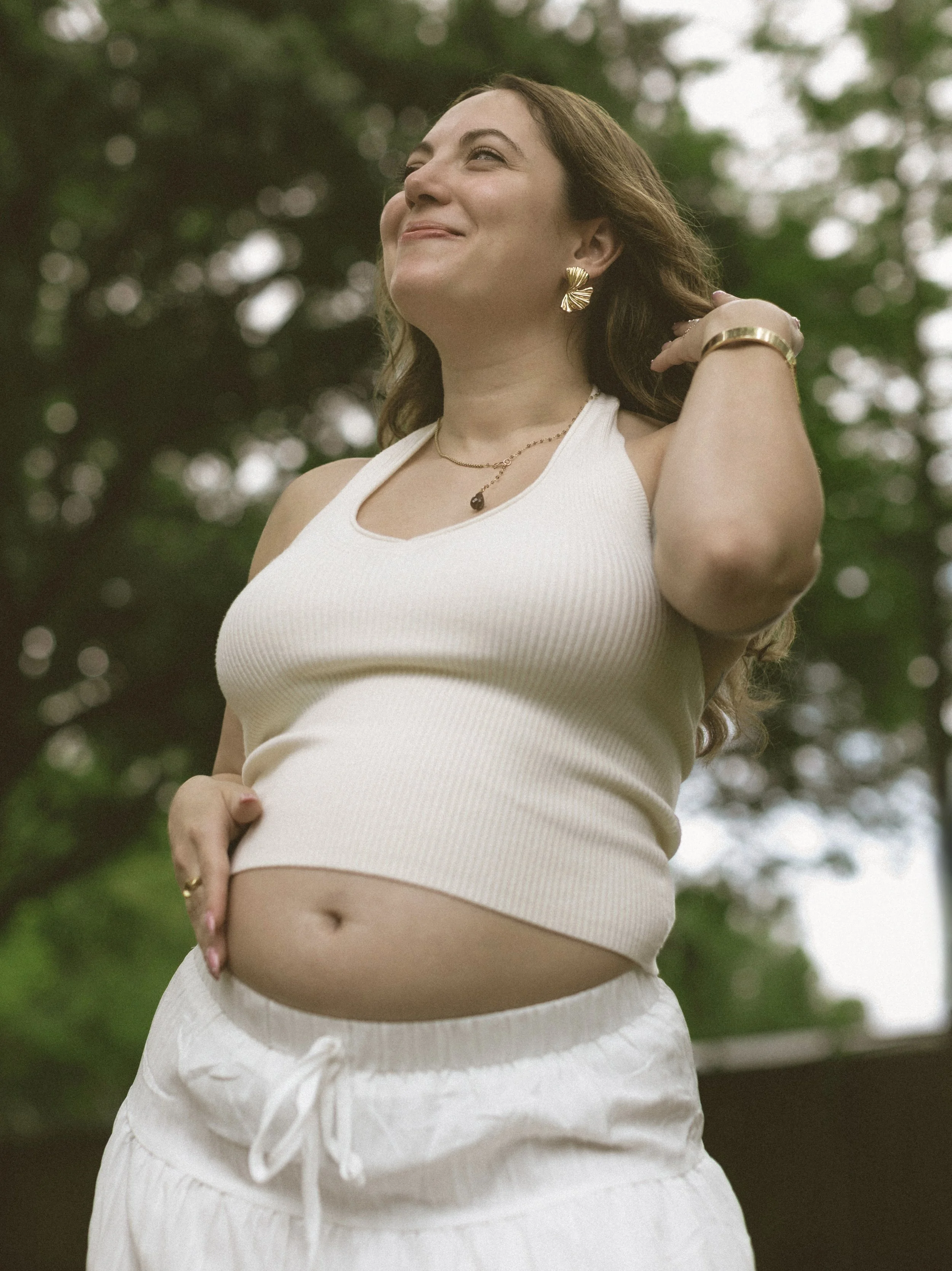 Intimate maternity portrait focused on connection and anticipation before welcoming baby.