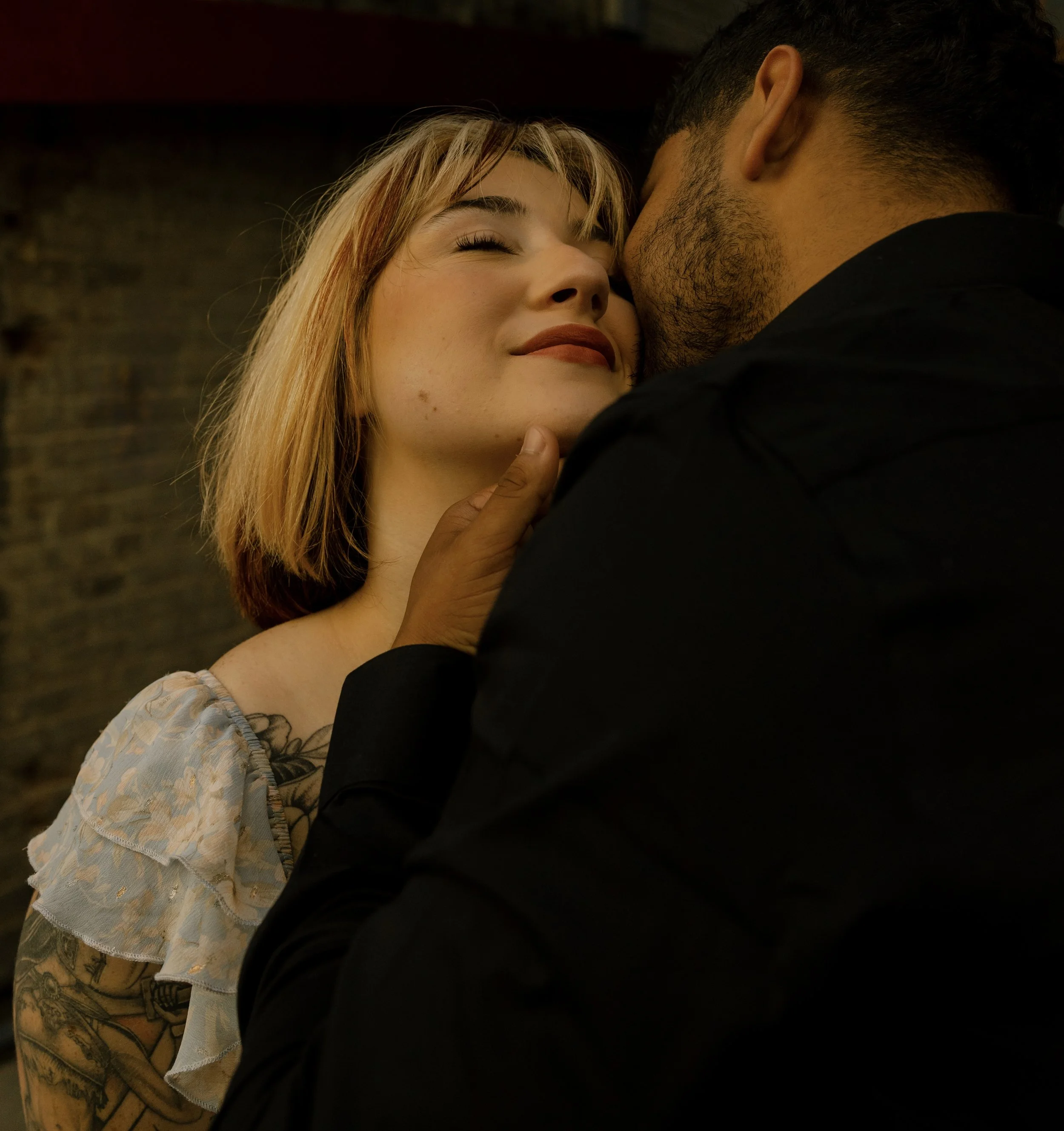 A soft, intimate moment between couple as the New Orleans sun begins to set. 