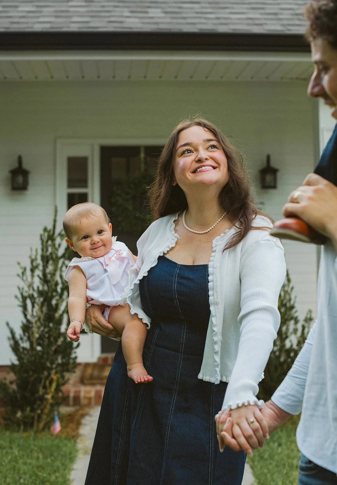Mother and baby sharing a quiet moment during a lifestyle family photography session in New Orleans.