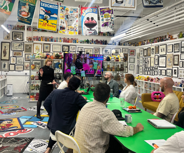 Susi Castle delivering a presentation on Distinctive Brand Assets to room of participants