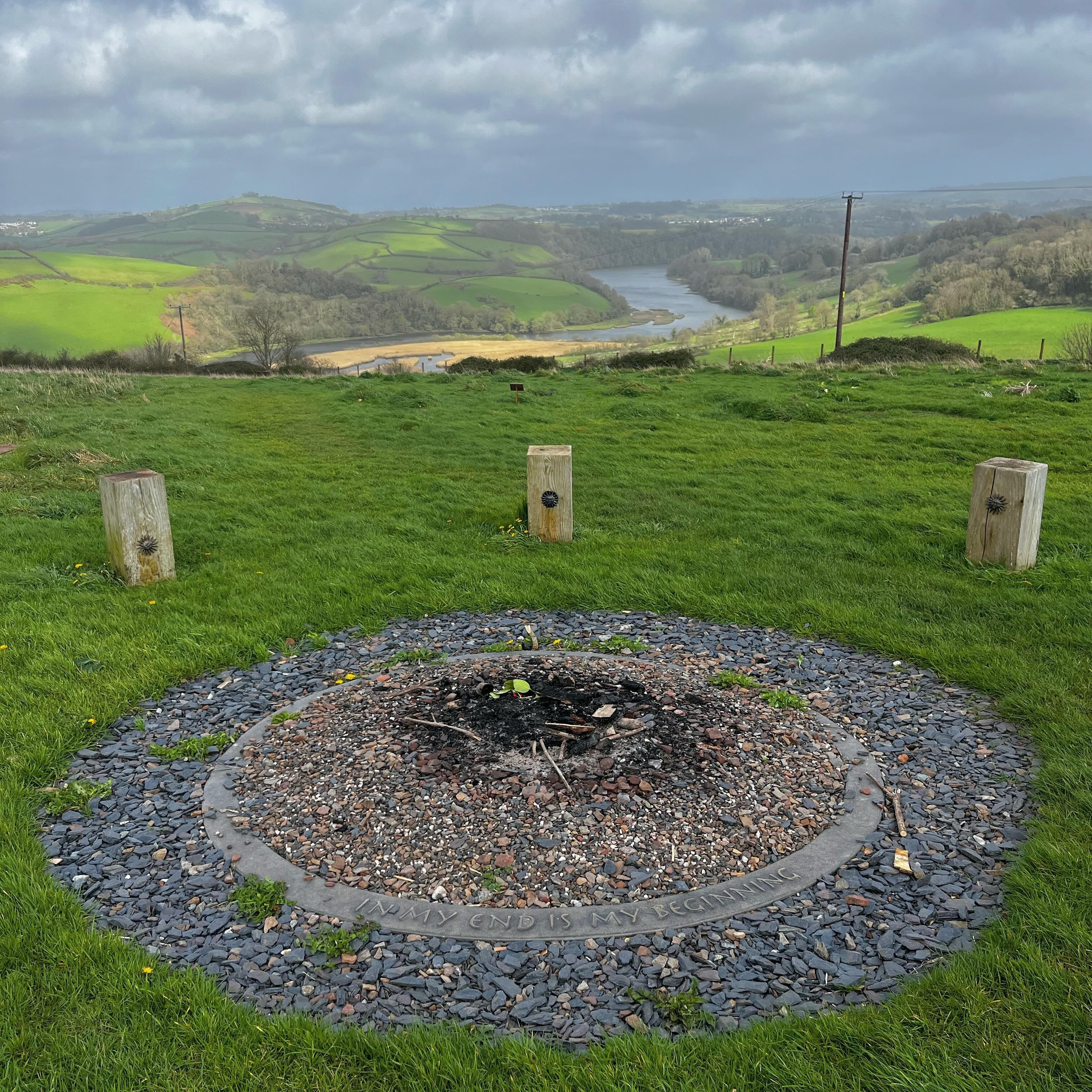 This is an incredibly sacred space. In a relational context, humans and this amazing landscape are intertwined through life and death. This is located in Devon, England. Overlooking the dear River Dart. It is the Sharpham Meadow Natural Burial Ground
