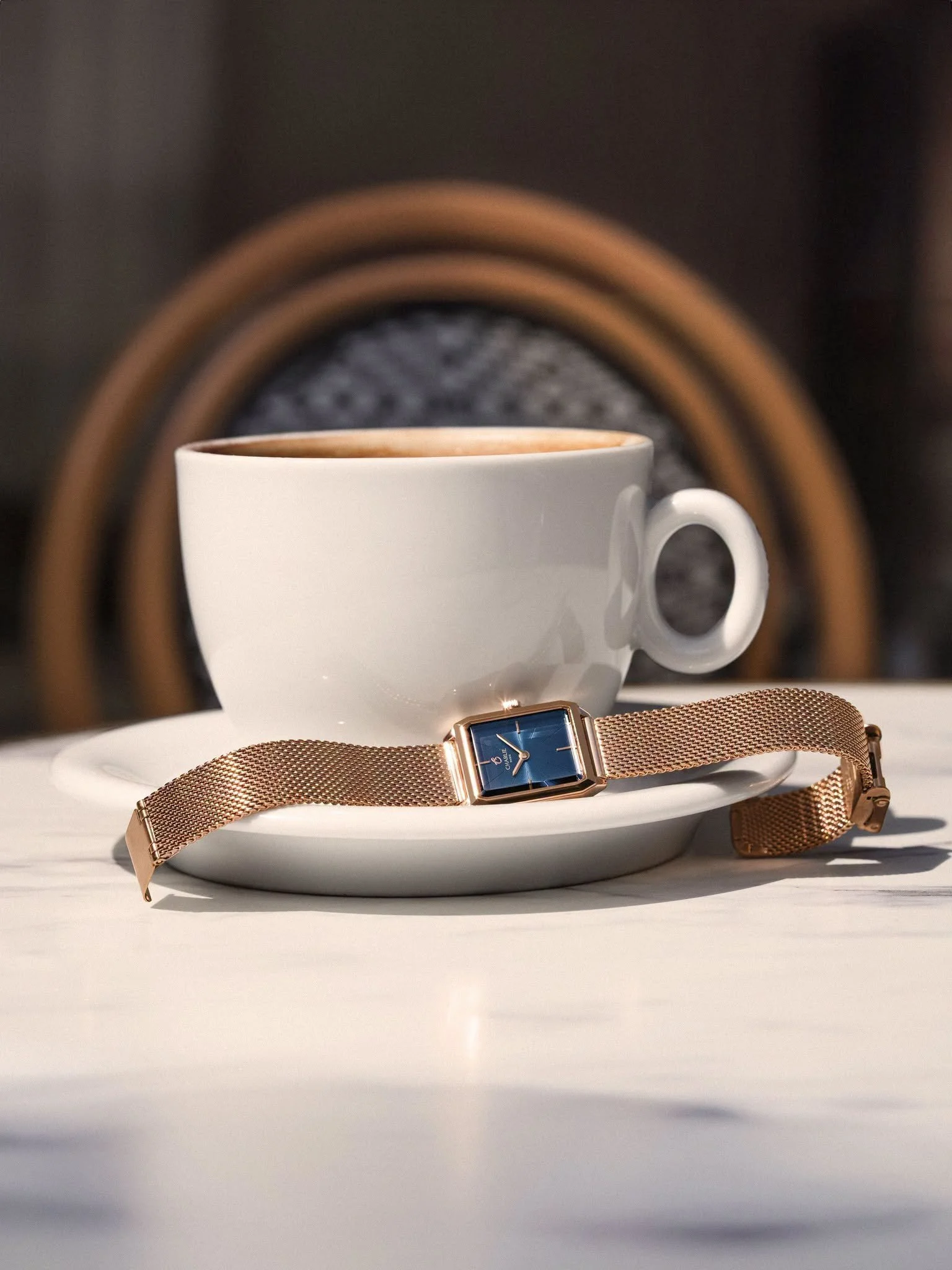 ladies watch with blue dial and rose gold bracelet