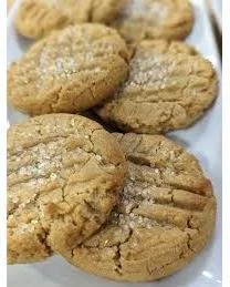 Come try our homemade peanut butter cookies, crafted with love and effort to bring you the perfect treat. Topped with sugar crystals for a crunchy contrast to their soft, chewy inside. Ideal for sharing and enjoying with friends and family.