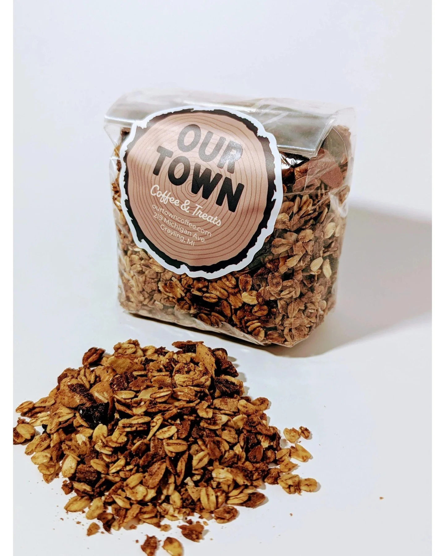The delightful crunch of our homemade granola is the perfect match for creamy yogurt and a drizzle of honey. Stop by Our Town Coffee &amp; Treats and treat yourself to this yummy favorite today!