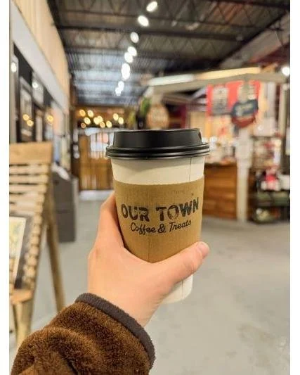 Discover the irresistible taste of Our Town Coffee &amp; Treats. Our expertly brewed coffee offers a flavorful escape that energizes your day and complements any weather condition, making it your go-to choice for every season.