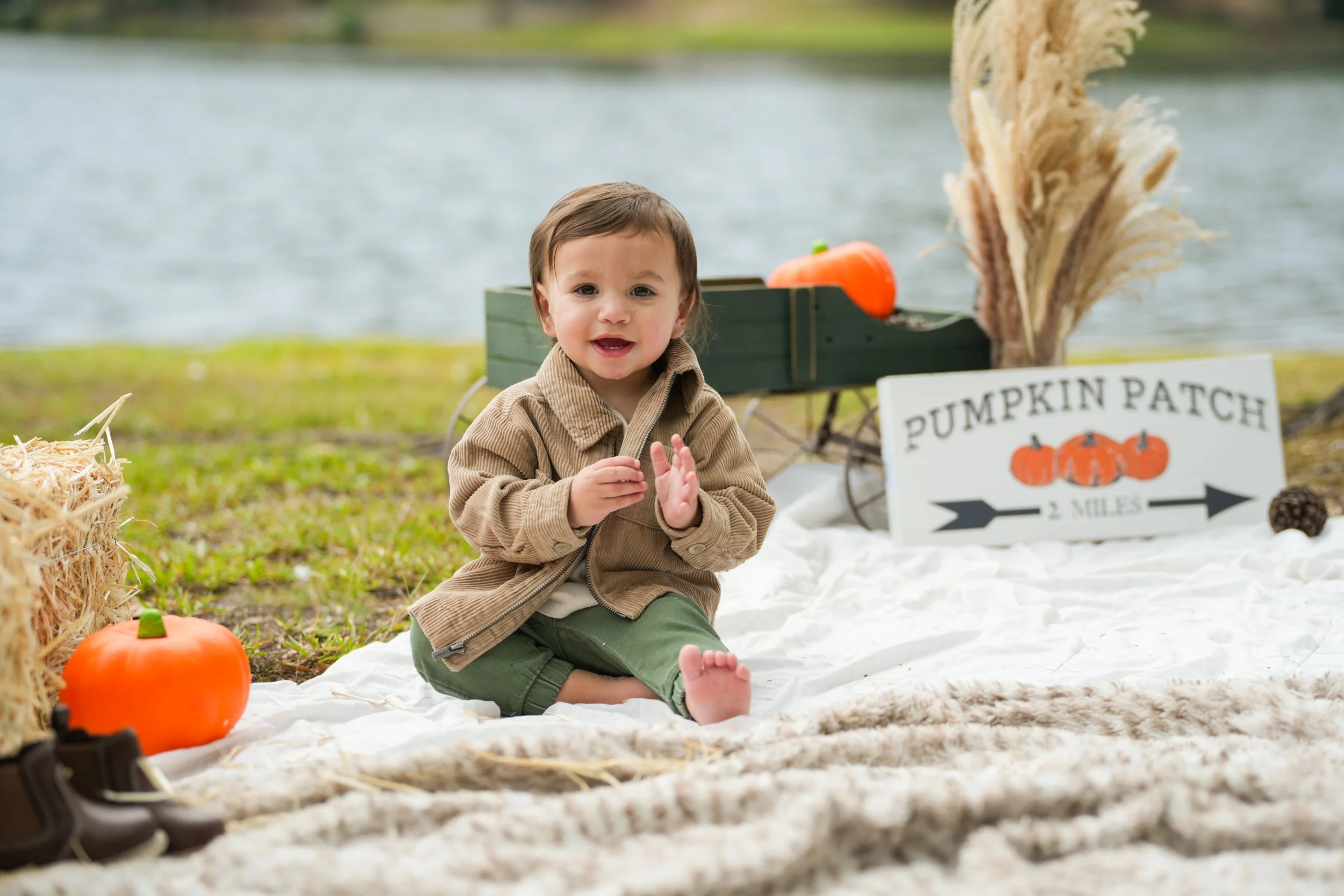 Infant portrait capturing joyful expressions in Buford GA