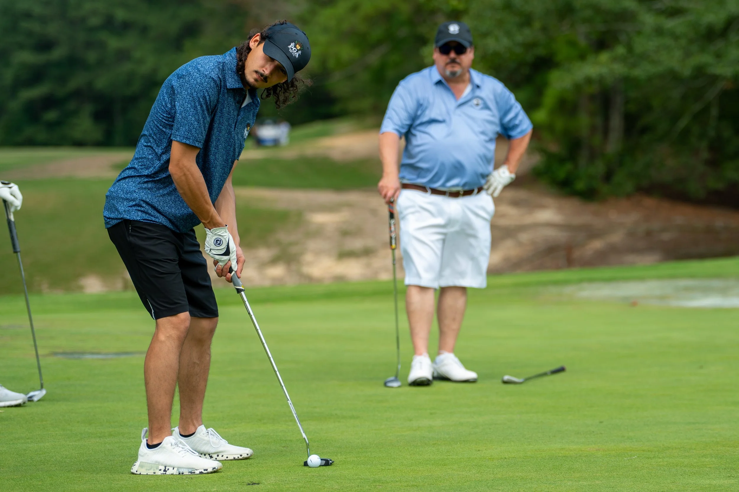 Corporate golf outing with participants on golf course