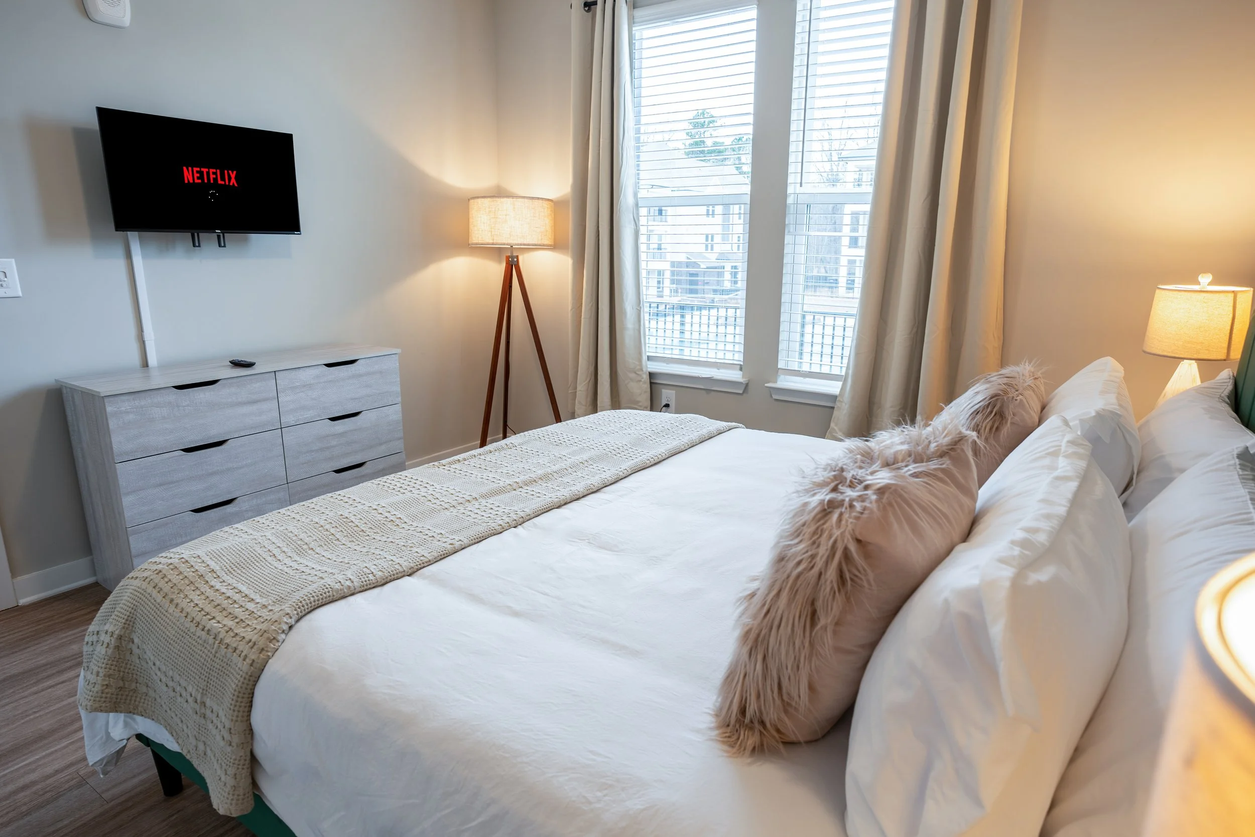 Secondary bedroom interior photographed professionally for real estate listing in Buford GA