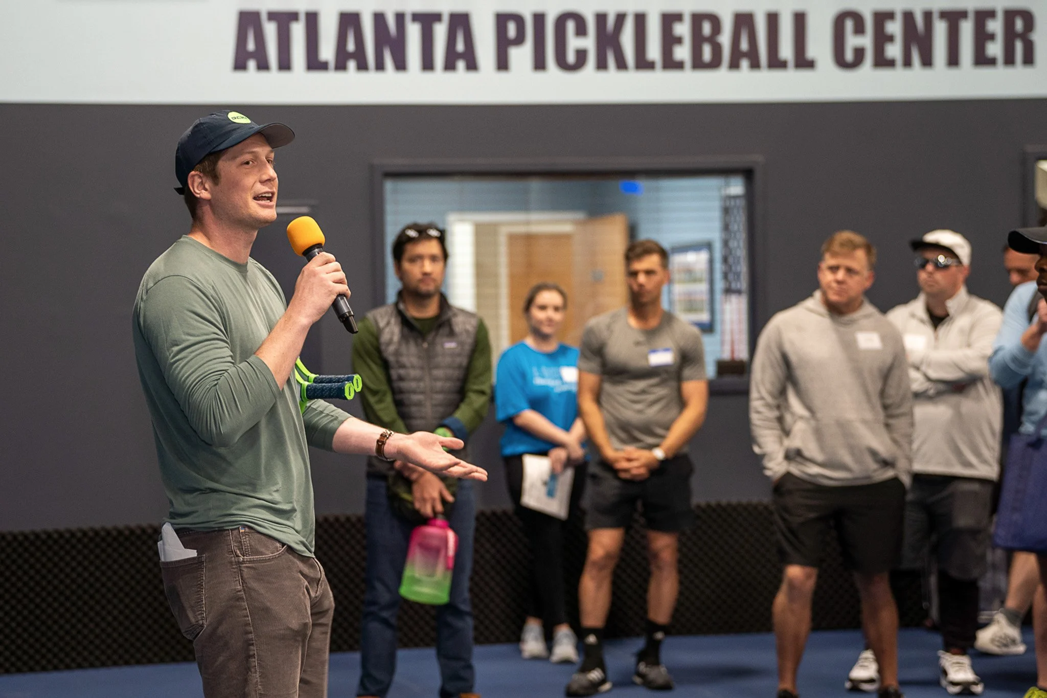Pickleball tournament with players competing on outdoor courts